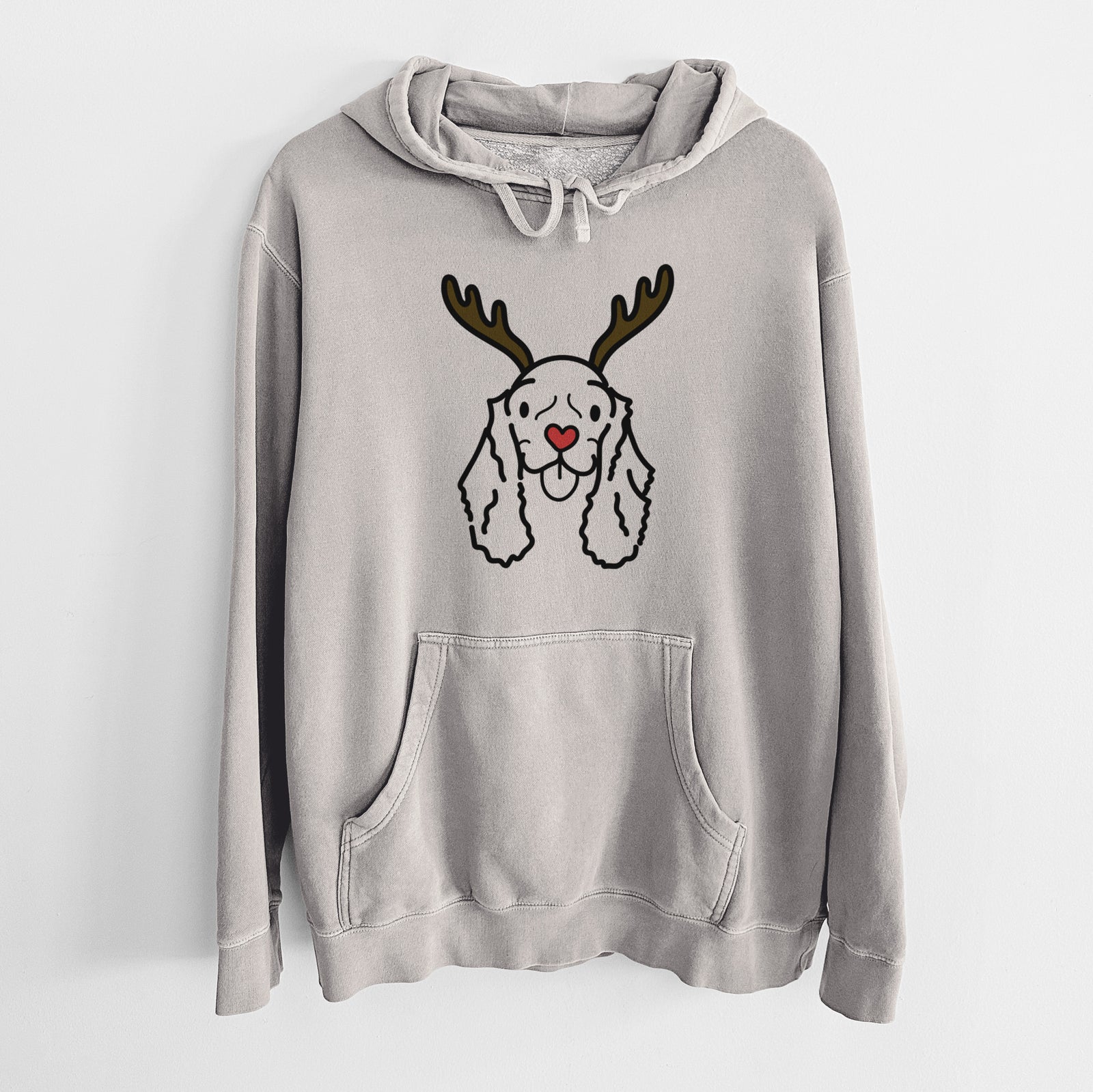 Minimalist line drawing of Bella the American Cocker Spaniel with reindeer antlers and a red nose on a Cement Unisex pigment dyed hoodie
