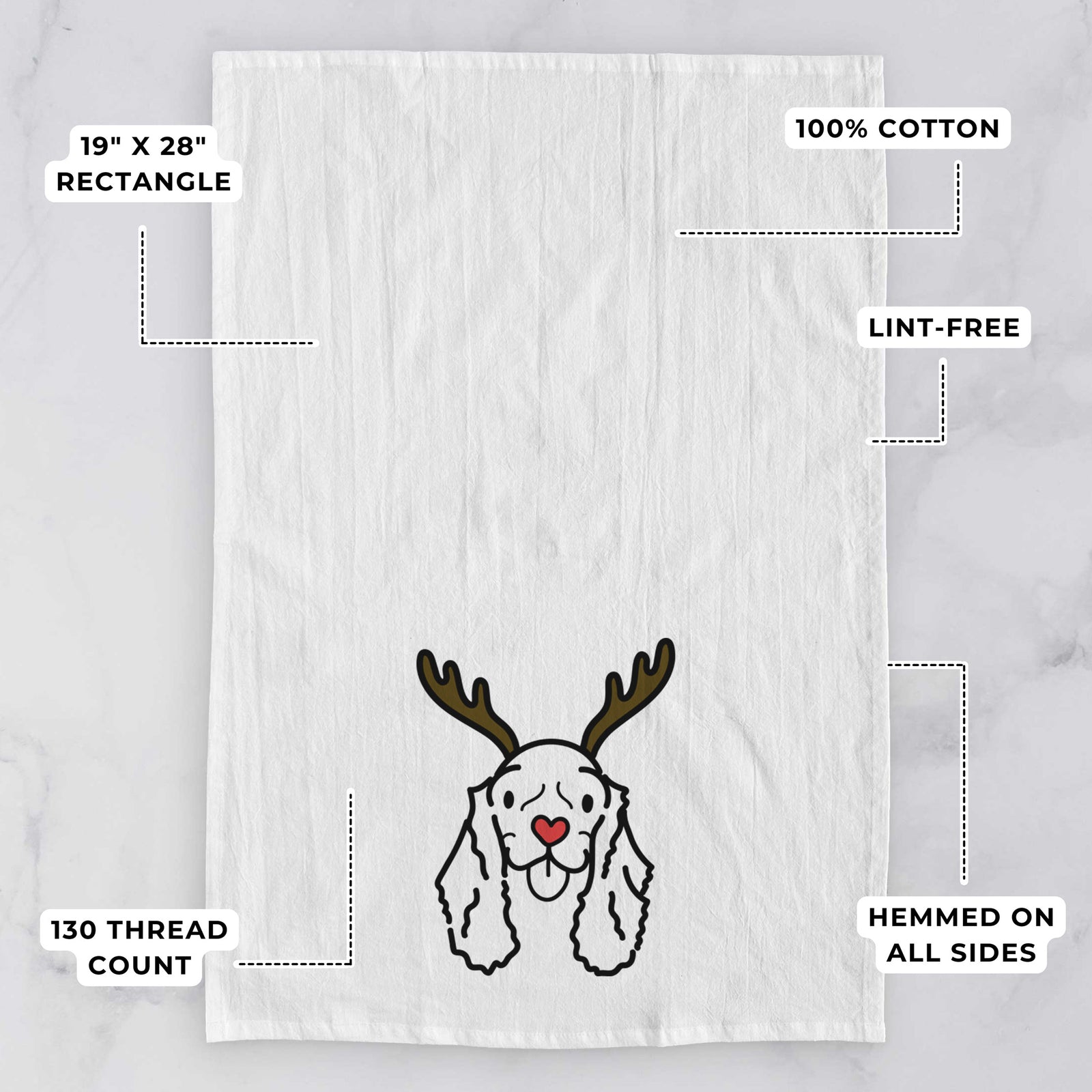 Minimalist line drawing of Bella the American Cocker Spaniel with reindeer antlers and a red nose on a tea towel, with feature callouts: 19 x 28 inch rectangle, 100% cotton, lint-free, 120 thread count, hemmed on all sides