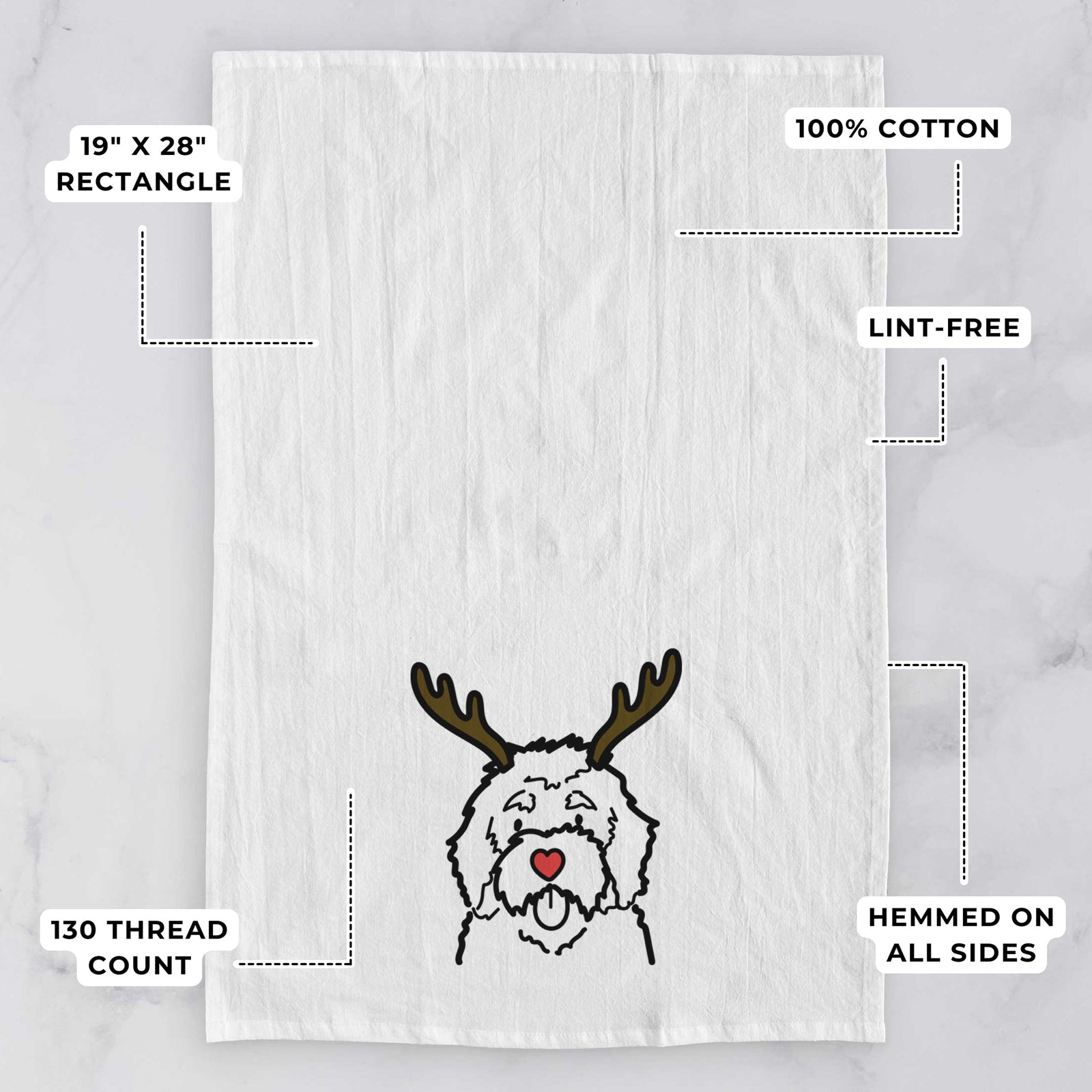 Minimalist line drawing of a Bernedoodle with reindeer antlers and a red nose on a tea towel, with feature callouts: 19 x 28 inch rectangle, 100% cotton, lint-free, 120 thread count, hemmed on all sides