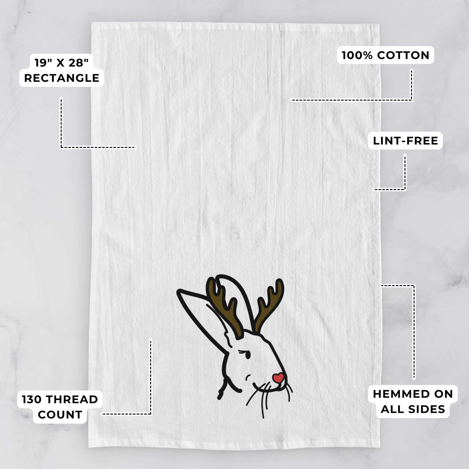 Minimalist line drawing of Betsy the Rex Rabbit with reindeer antlers and a red nose on a tea towel, with feature callouts: 19 x 28 inch rectangle, 100% cotton, lint-free, 120 thread count, hemmed on all sides