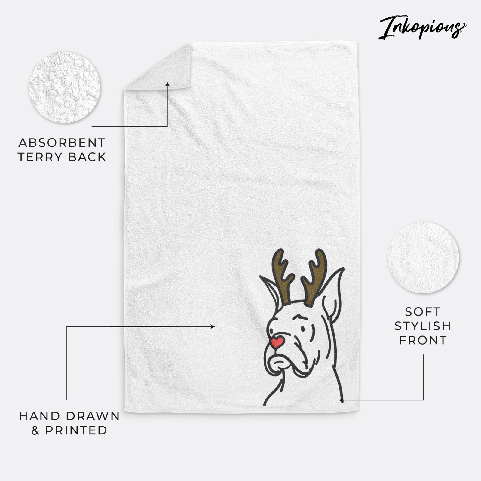 Minimalist line drawing of Billy the Rescue Boxer with reindeer antlers and a red nose on a hand towel