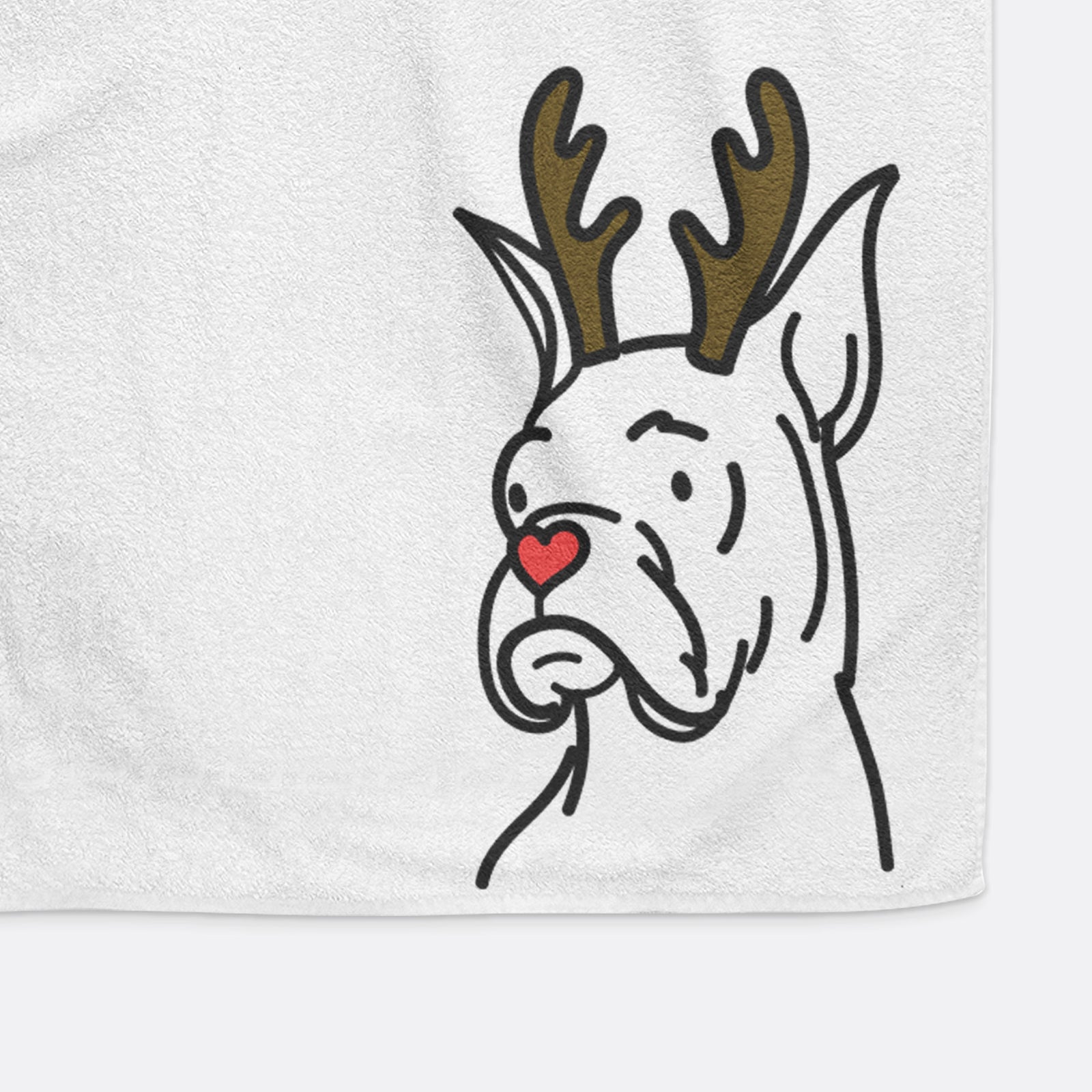 Minimalist line drawing of Billy the Rescue Boxer with reindeer antlers and a red nose on a hand towel