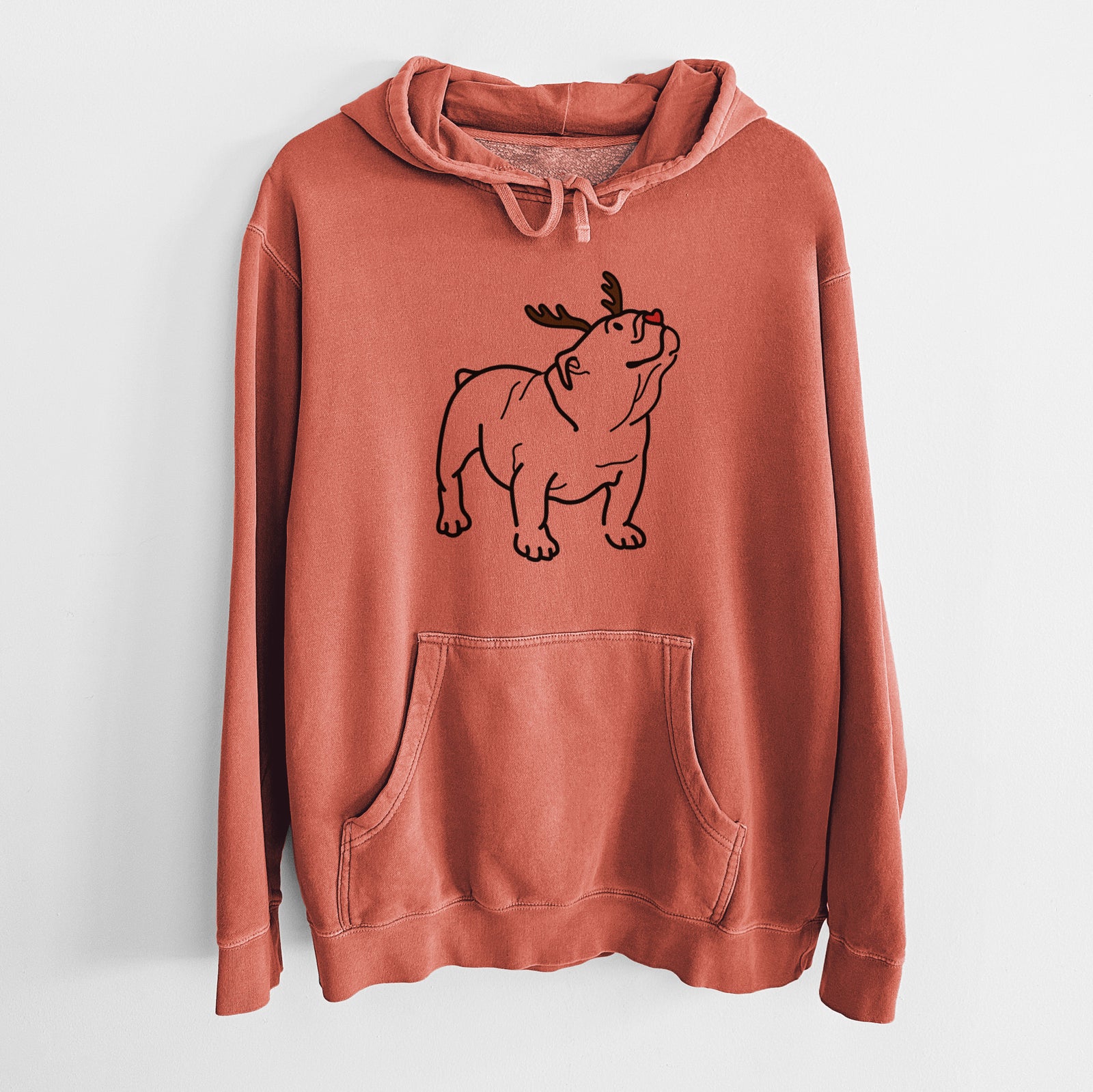 Minimalist line drawing of Bruno the English Bulldog with reindeer antlers and a red nose on an Amber Unisex pigment dyed hoodie