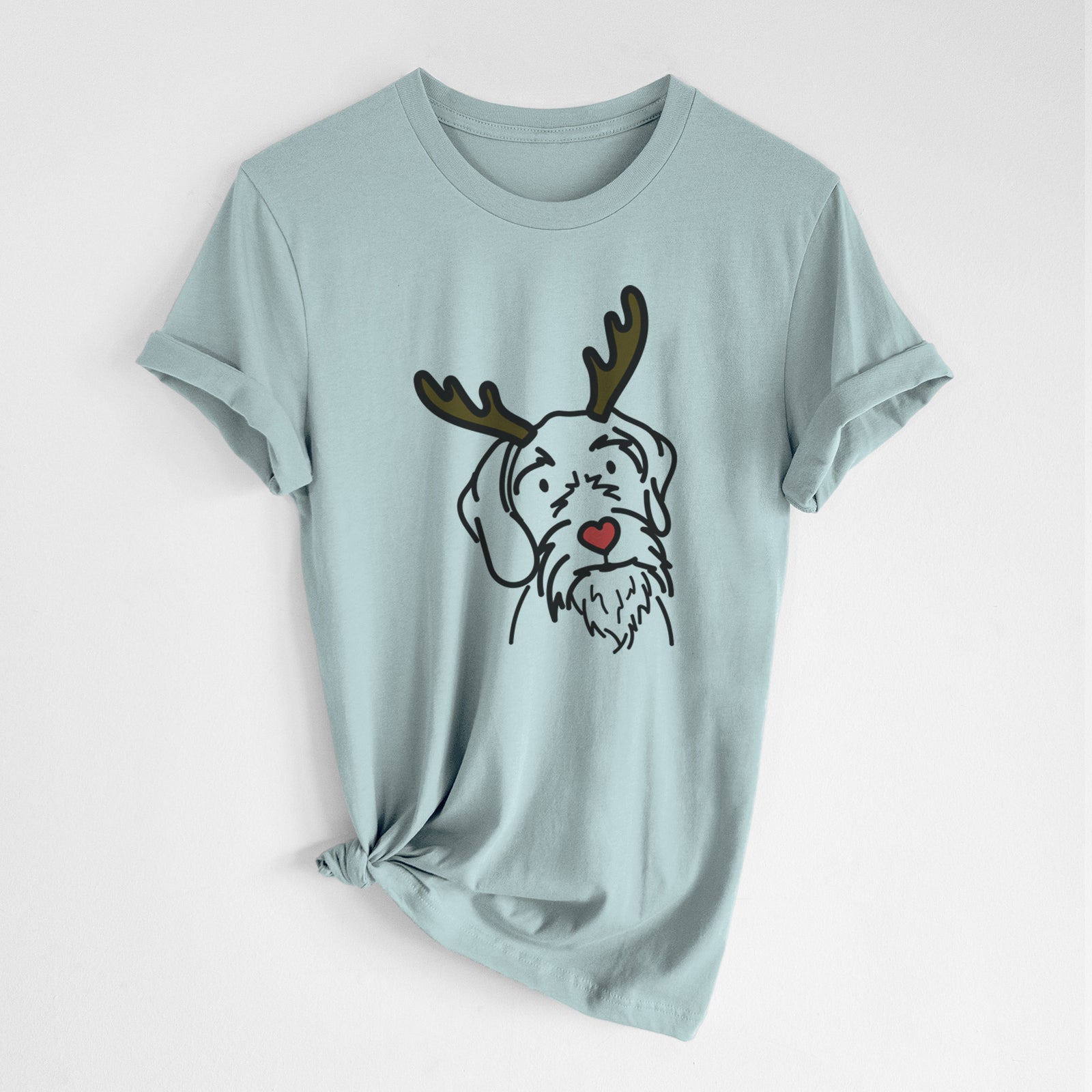 Minimalist line drawing of Buck the German Wirehaired Pointer with reindeer antlers and a red nose on a Dusty Blue Unisex crewneck, worn by a woman