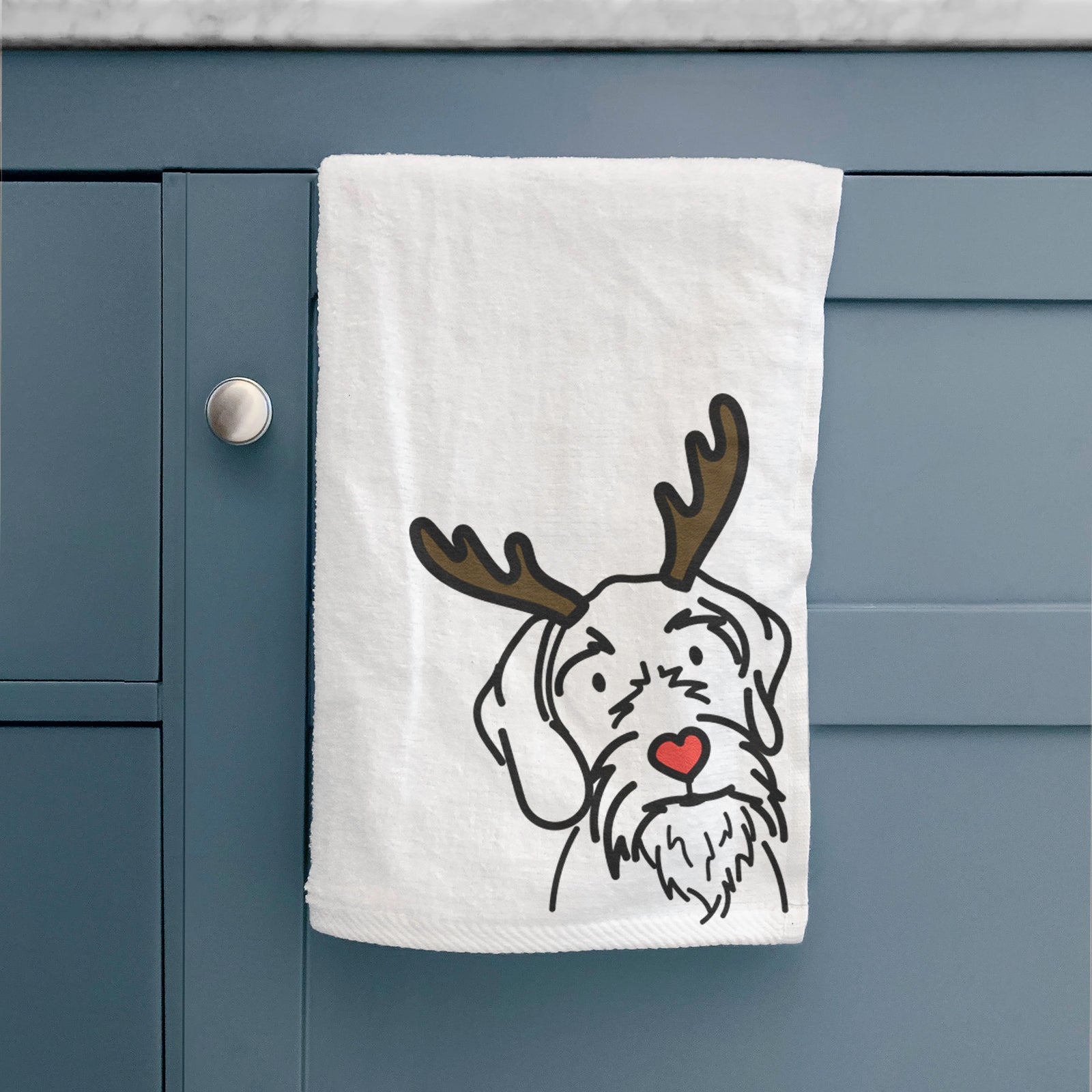 Minimalist line drawing of Buck the German Wirehaired Pointer with reindeer antlers and a red nose on a hand towel