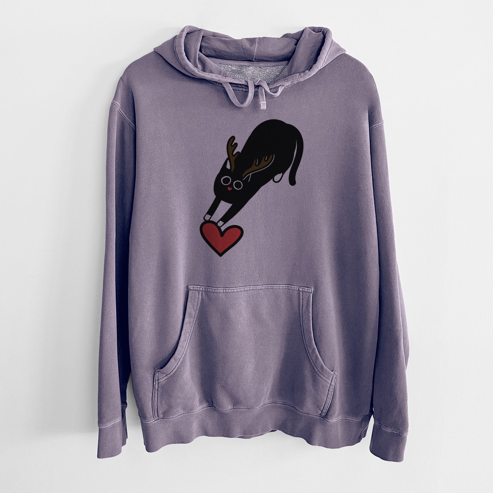 Minimalist line drawing of Bug the Black Cat with reindeer antlers and a red nose on a Plum Unisex pigment dyed hoodie
