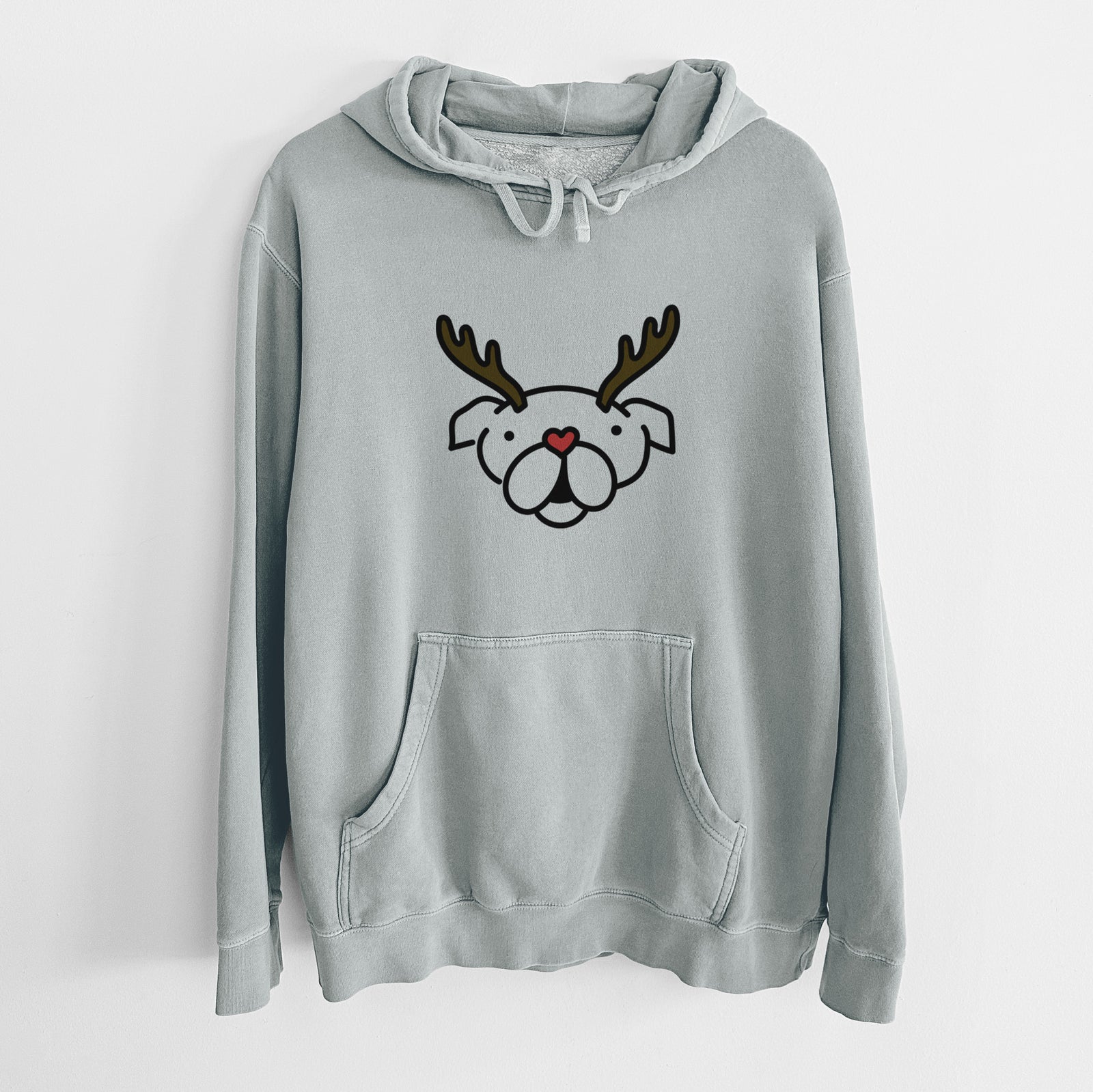 Minimalist line drawing of an English Bulldog with reindeer antlers and a red nose on a Sage Unisex pigment dyed hoodie