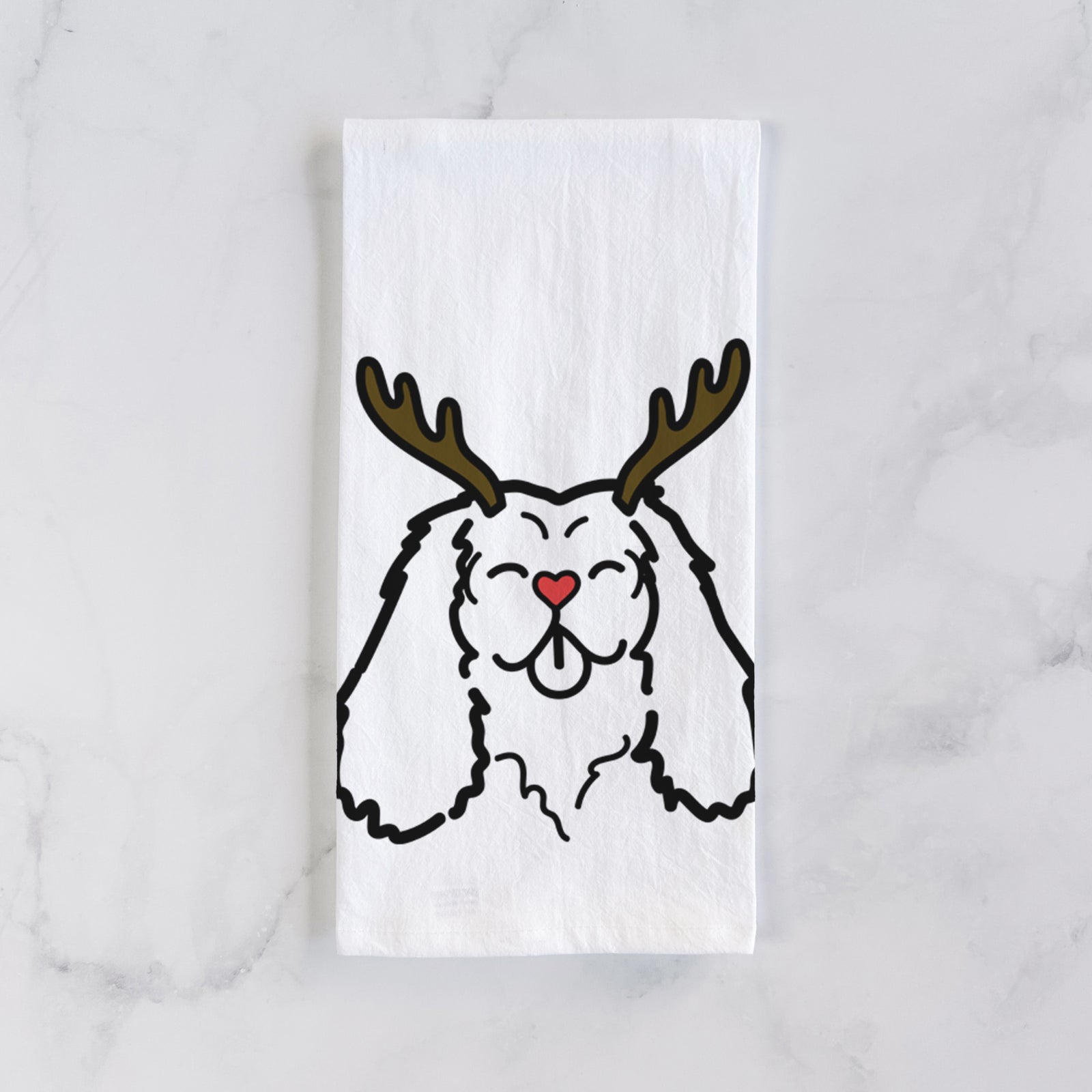 Minimalist line drawing of a Cavalier King Charles Spaniel with reindeer antlers and a red nose on a tea towel