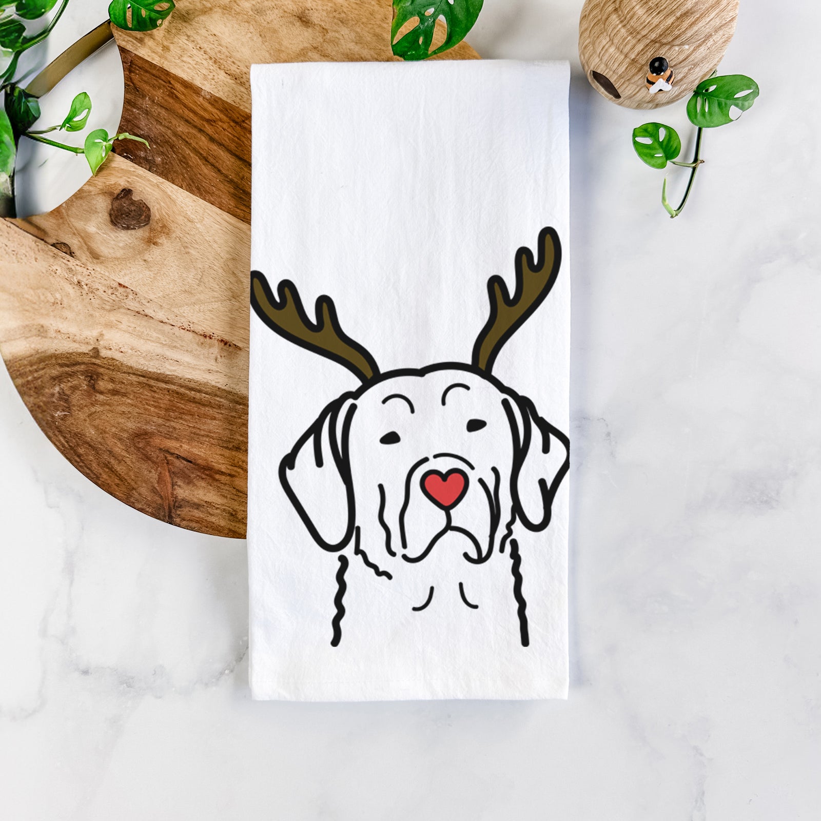 Minimalist line drawing of a Chesapeake Bay Retriever with reindeer antlers and a red nose on a tea towel