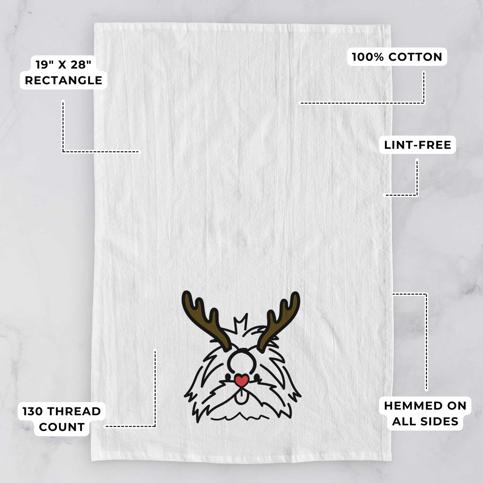 Minimalist line drawing of CoCo the Shih Tzu with reindeer antlers and a red nose on a tea towel, with feature callouts: 19 x 28 inch rectangle, 100% cotton, lint-free, 120 thread count, hemmed on all sides