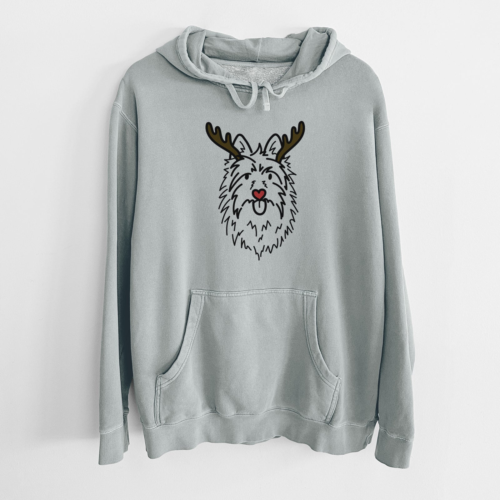 Minimalist line drawing of Digger the Australian Terrier with reindeer antlers and a red nose on a Sage Unisex pigment dyed hoodie