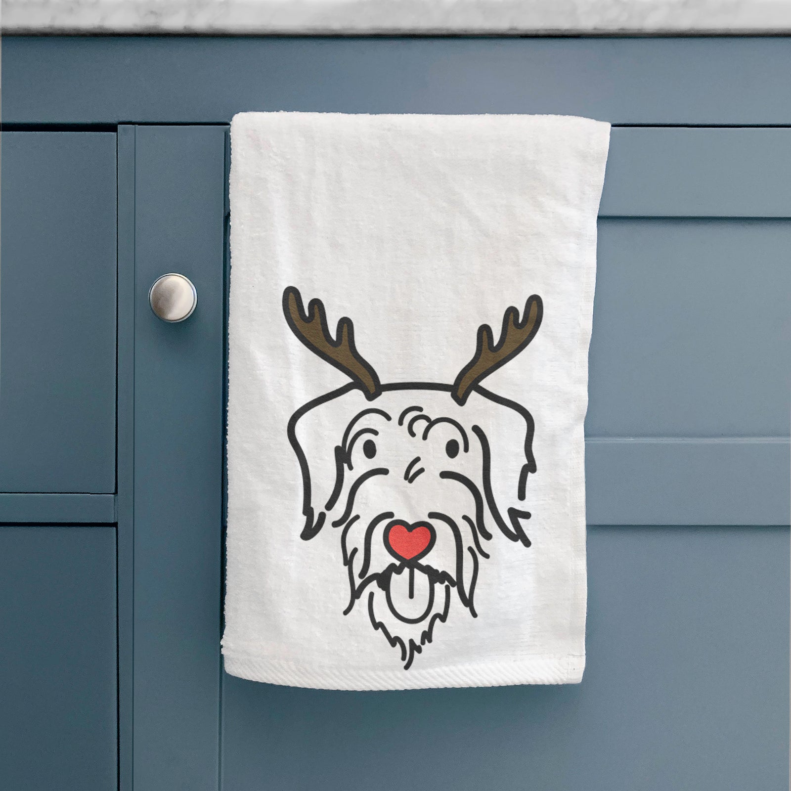 Minimalist line drawing of Dug the Doodle with reindeer antlers and a red nose on a decorative hand towel