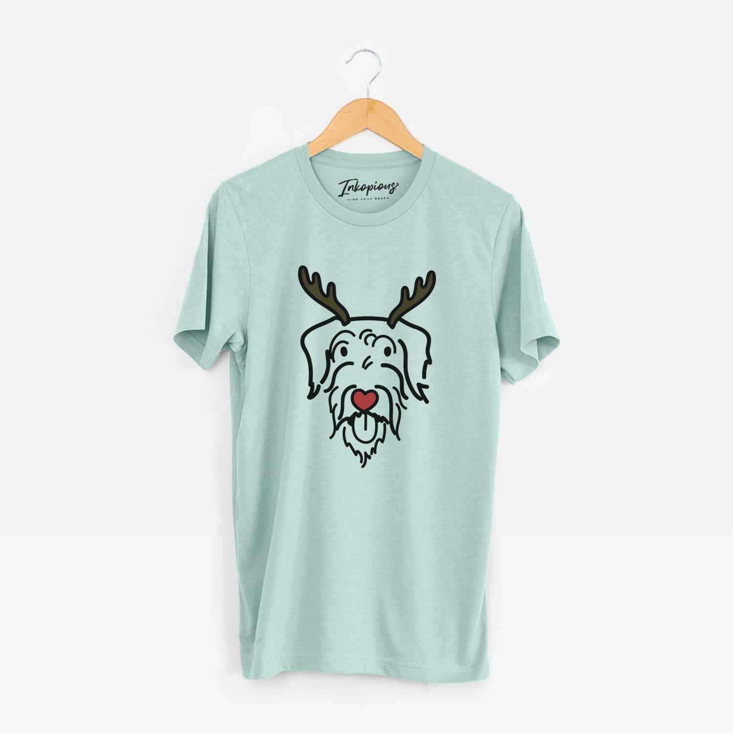 Minimalist line drawing of Dug the Doodle with reindeer antlers and a red nose on a Heather Sage Unisex crewneck