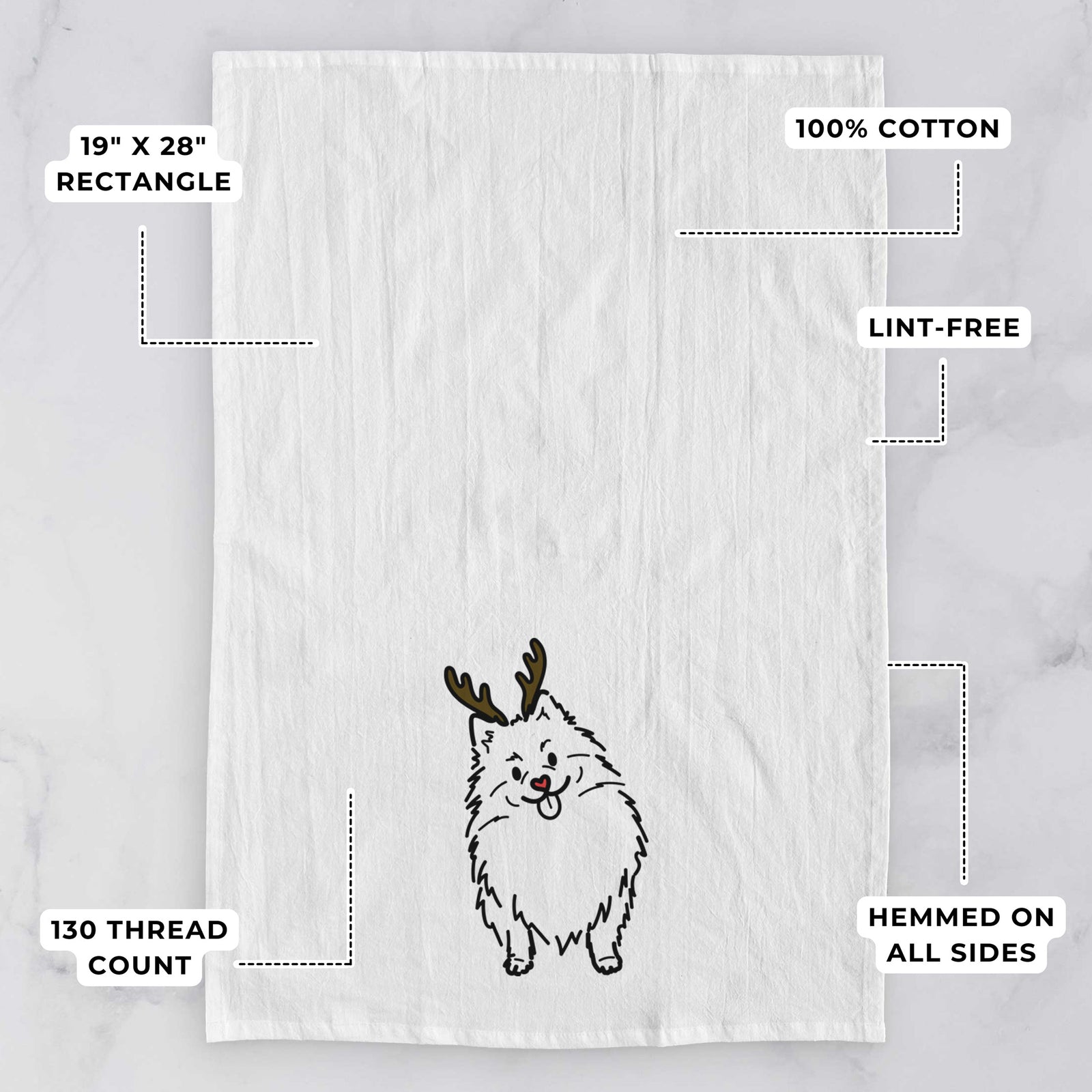 Minimalist line drawing of Fern the Pomeranian with reindeer antlers and a red nose on a tea towel, with feature callouts: 19 x 28 inch rectangle, 100% cotton, lint-free, 120 thread count, hemmed on all sides