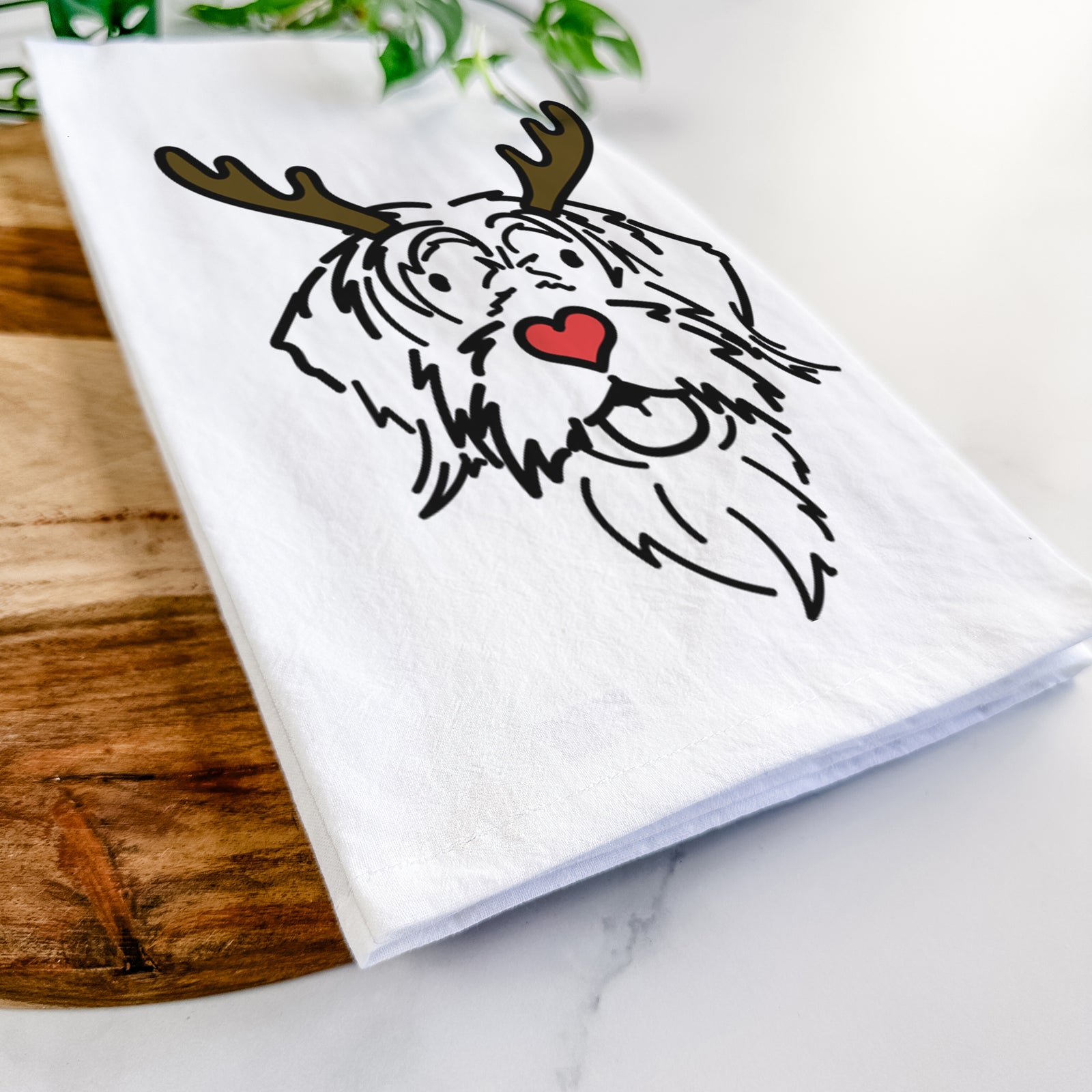 Minimalist line drawing of Gary the Wirehaird Pointing Griffon with reindeer antlers and a red nose on a tea towel