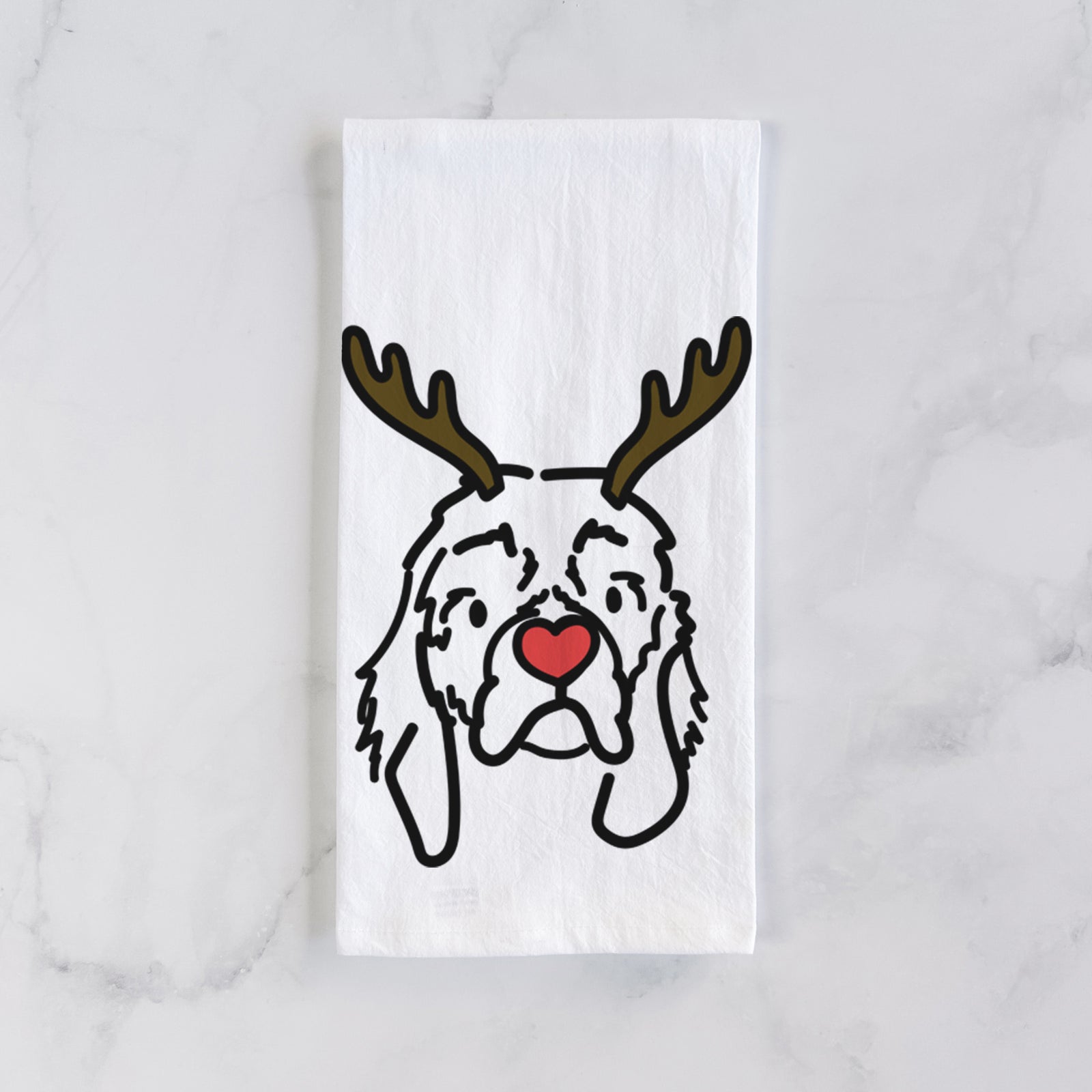 Minimalist line drawing of GiGi the Cocker Spaniel with reindeer antlers and a red nose on a tea towel