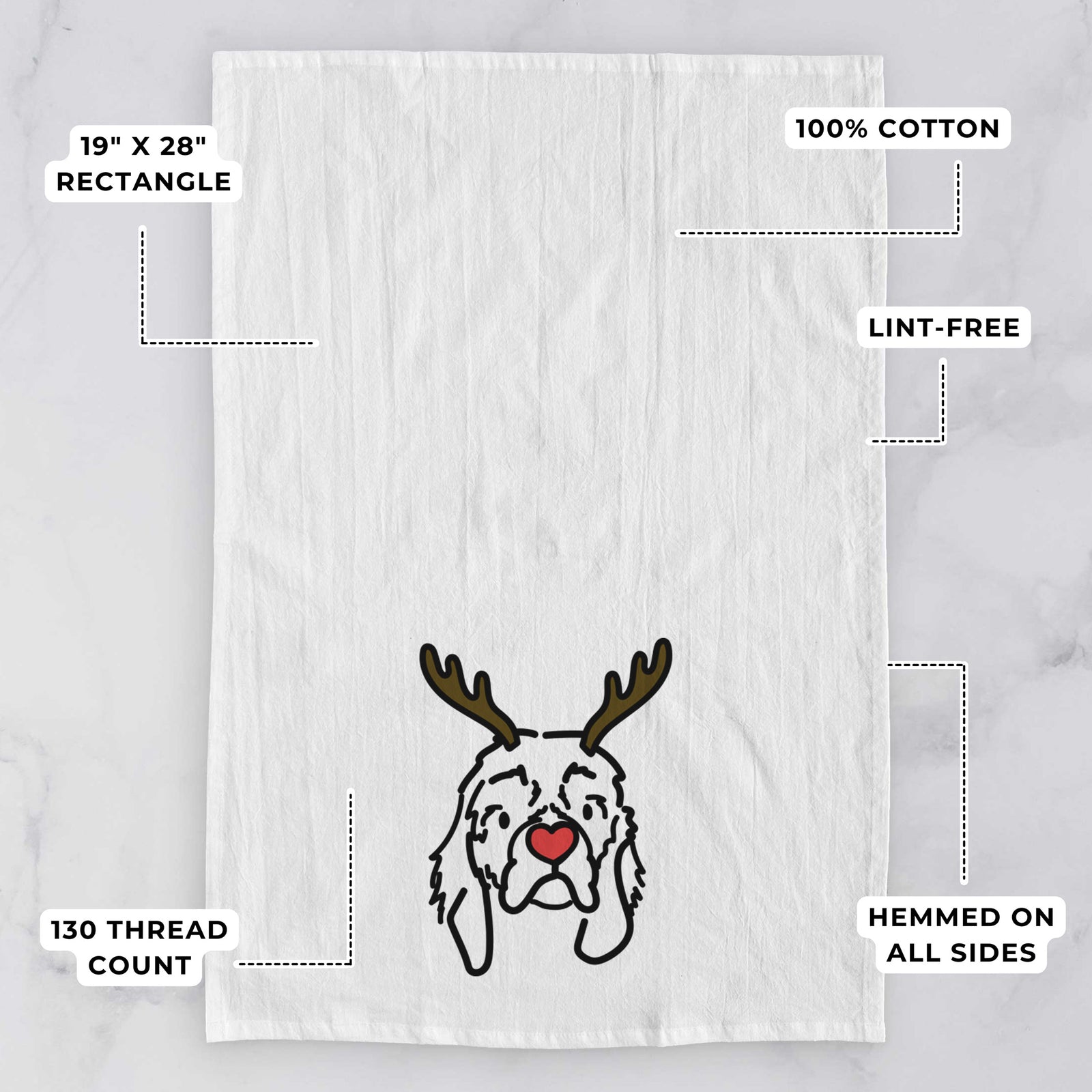 Minimalist line drawing of GiGi the Cocker Spaniel with reindeer antlers and a red nose on a tea towel, with feature callouts: 19 x 28 inch rectangle, 100% cotton, lint-free, 120 thread count, hemmed on all sides