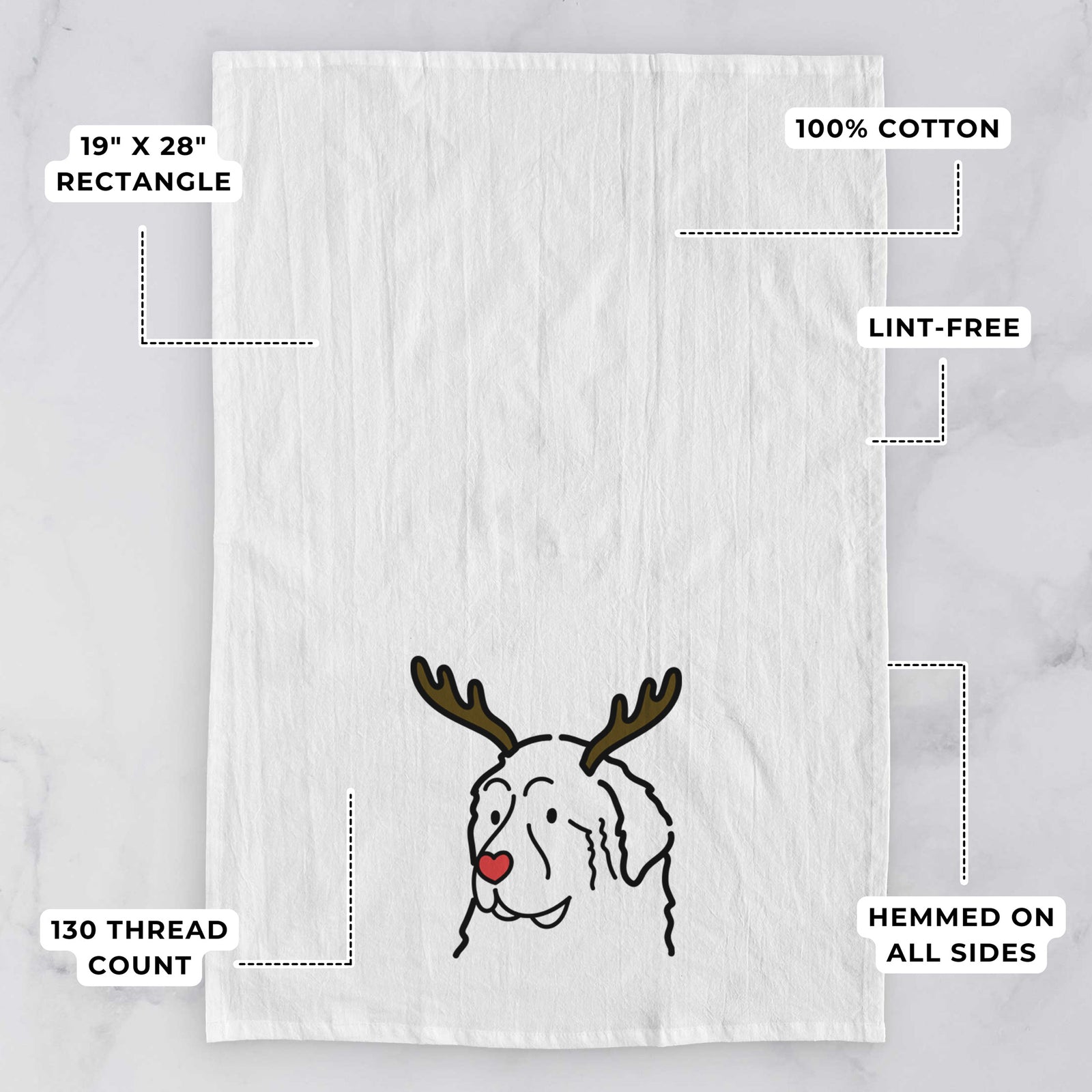 Minimalist line drawing of a Great Pyrenees with reindeer antlers and a red nose on a tea towel, with feature callouts: 19 x 28 inch rectangle, 100% cotton, lint-free, 120 thread count, hemmed on all sides