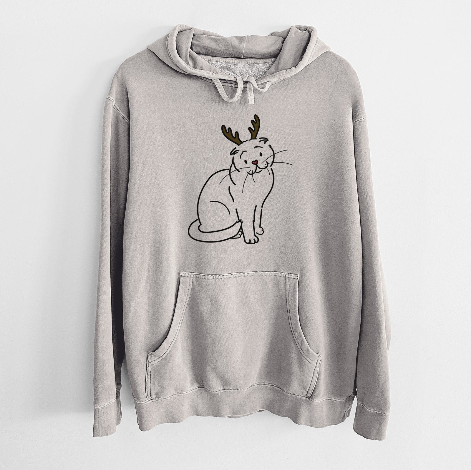 Minimalist line drawing of Hank the Scottish Fold Cat with reindeer antlers and a red nose on a Cement Unisex pigment dyed hoodie