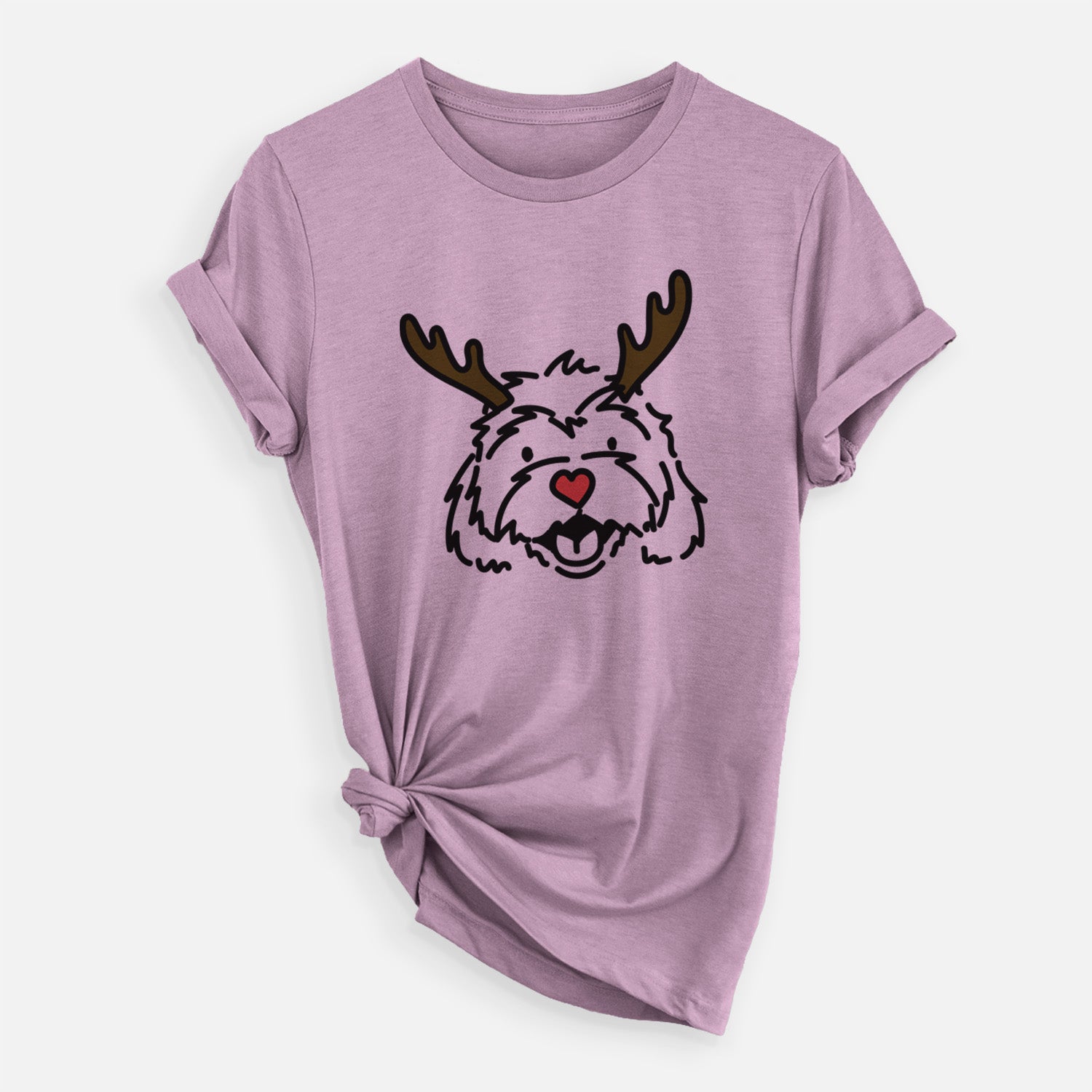 Minimalist line drawing of Harry the Cavachon with reindeer antlers and a red nose on an Orchid Unisex crewneck, worn by a woman