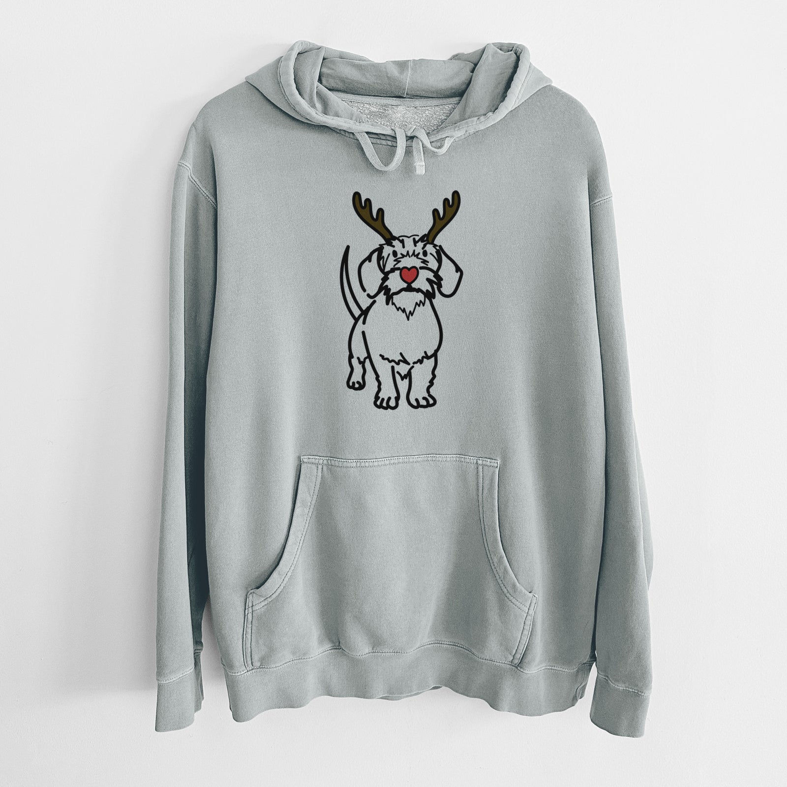 Minimalist line drawing of Henry the Wire Dachshund with reindeer antlers and a red nose on a Sage Unisex pigment dyed hoodie