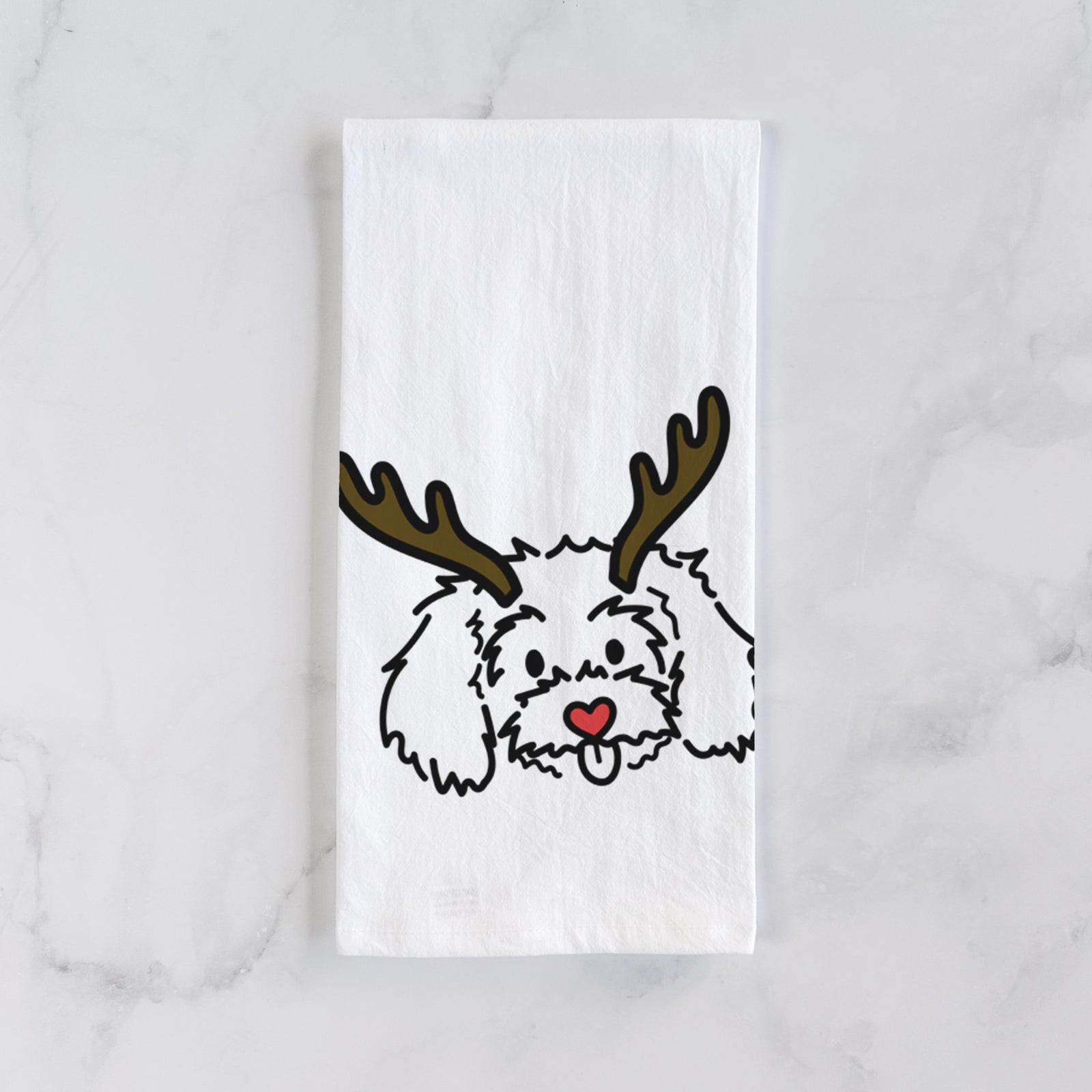 Minimalist line drawing of Holly the Maltipoo with reindeer antlers and a red nose on a tea towel