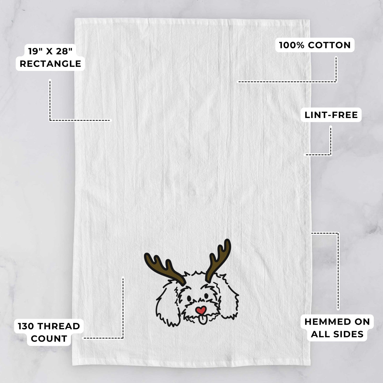 Minimalist line drawing of Holly the Maltipoo with reindeer antlers and a red nose on a tea towel, with feature callouts: 19 x 28 inch rectangle, 100% cotton, lint-free, 120 thread count, hemmed on all sides
