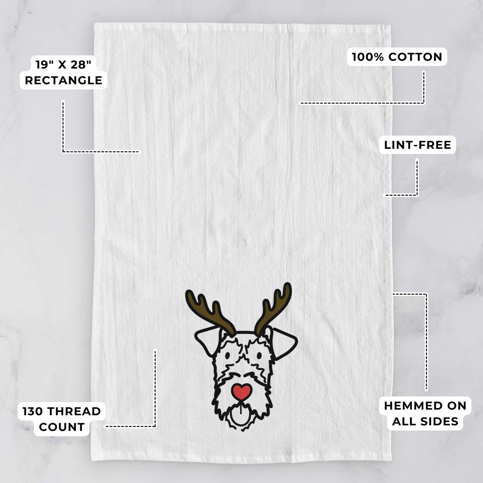 Minimalist line drawing of an Irish Terrier with reindeer antlers and a red nose on a tea towel, with feature callouts: 19 x 28 inch rectangle, 100% cotton, lint-free, 120 thread count, hemmed on all sides