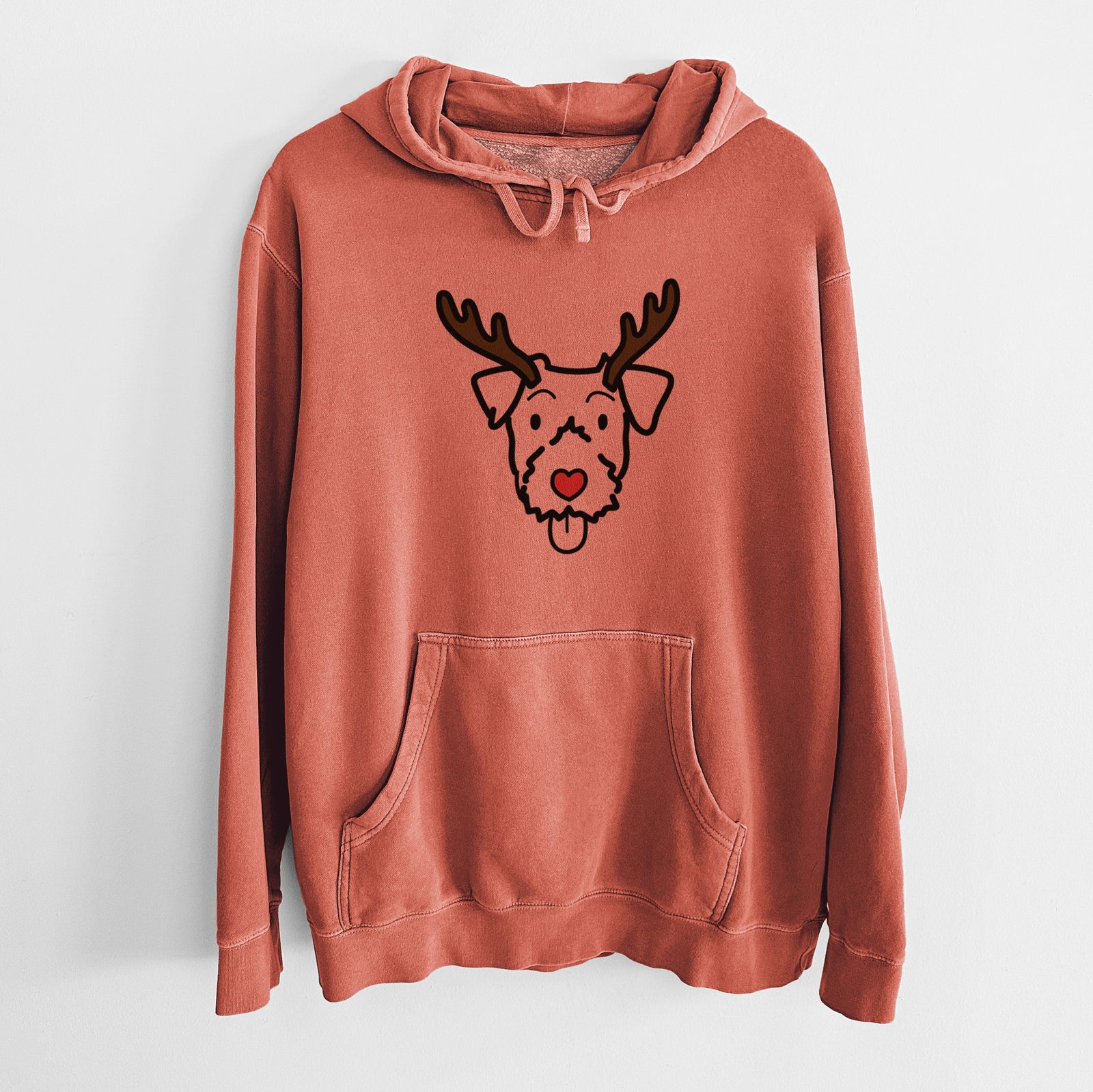 Minimalist line drawing of a Jack Russell Terrier with reindeer antlers and a red nose on an Amber Unisex pigment dyed hoodie