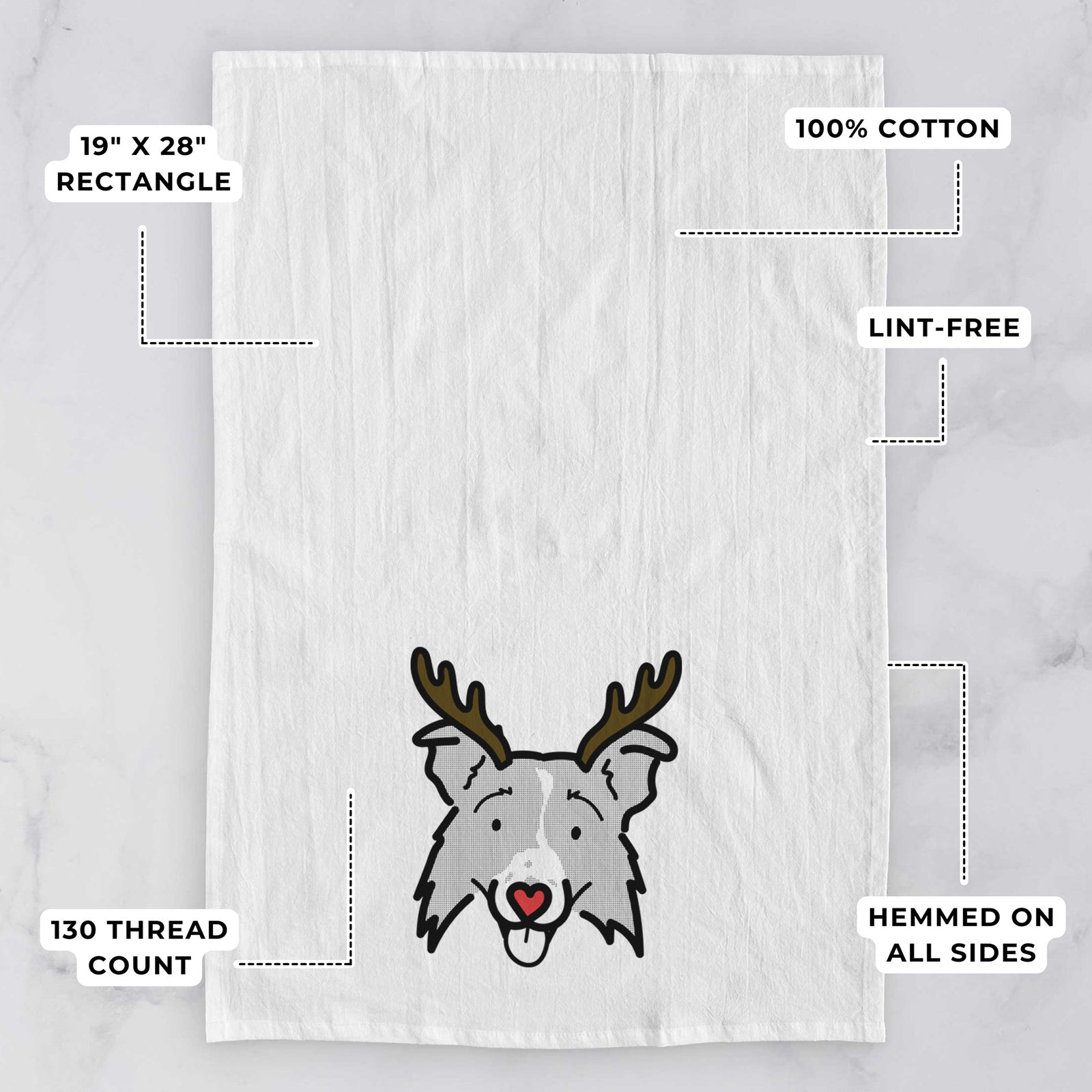 Minimalist line drawing of Jam the Border Collie 2.0 with reindeer antlers and a red nose on a tea towel, with feature callouts: 19 x 28 inch rectangle, 100% cotton, lint-free, 120 thread count, hemmed on all sides