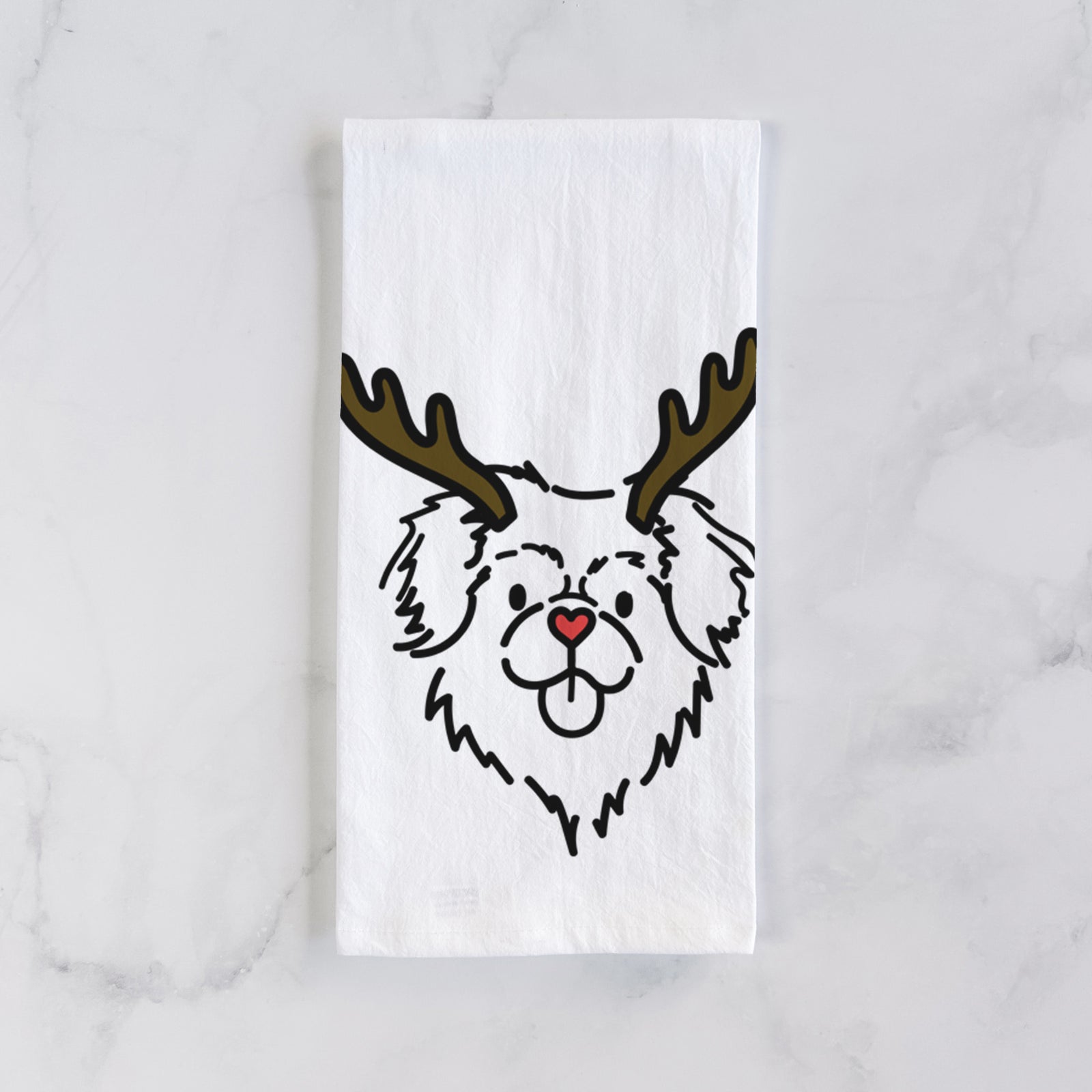 Minimalist line drawing of Jiji the Tibetan Spaniel with reindeer antlers and a red nose on a tea towel