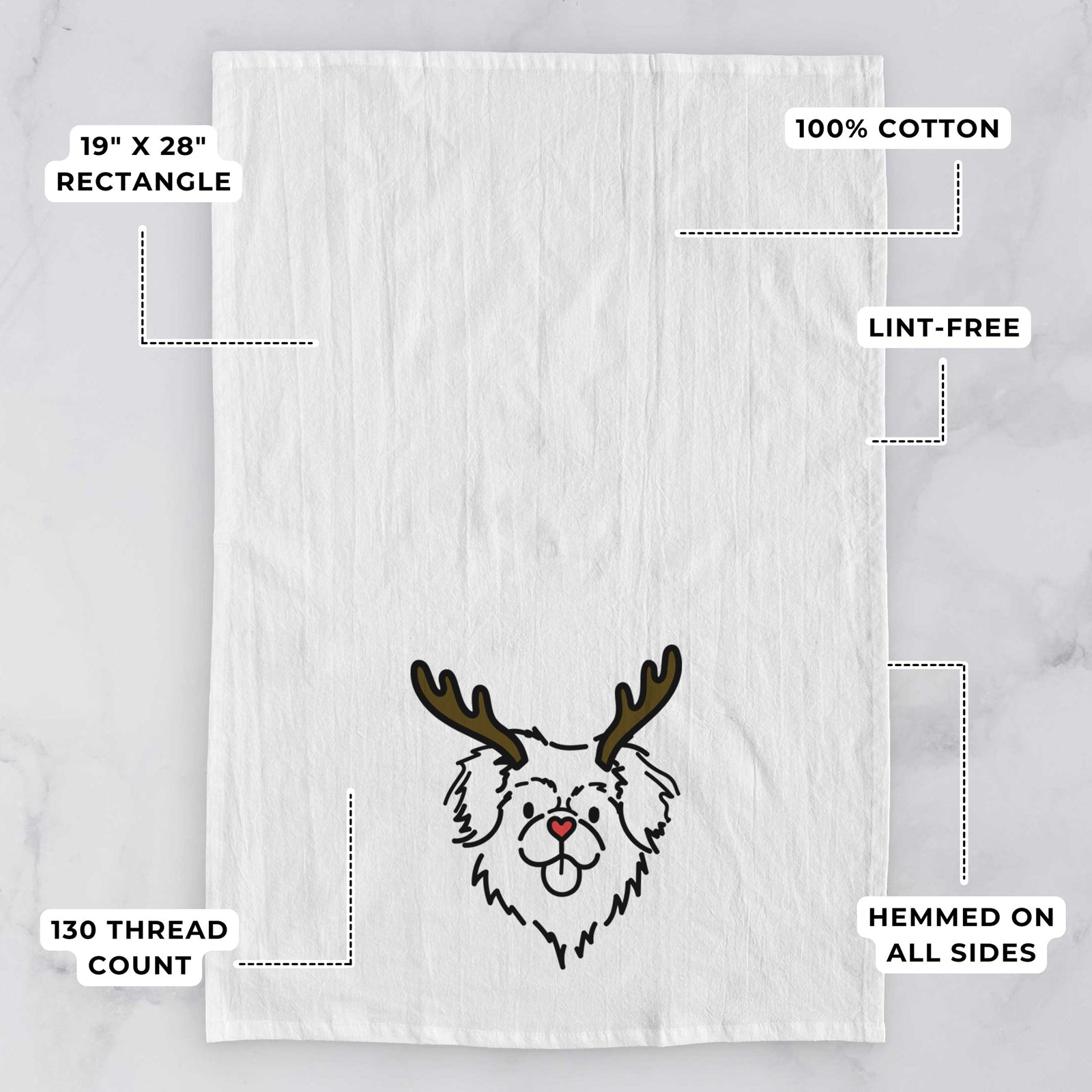 Minimalist line drawing of Jiji the Tibetan Spaniel with reindeer antlers and a red nose on a tea towel, with feature callouts: 19 x 28 inch rectangle, 100% cotton, lint-free, 120 thread count, hemmed on all sides