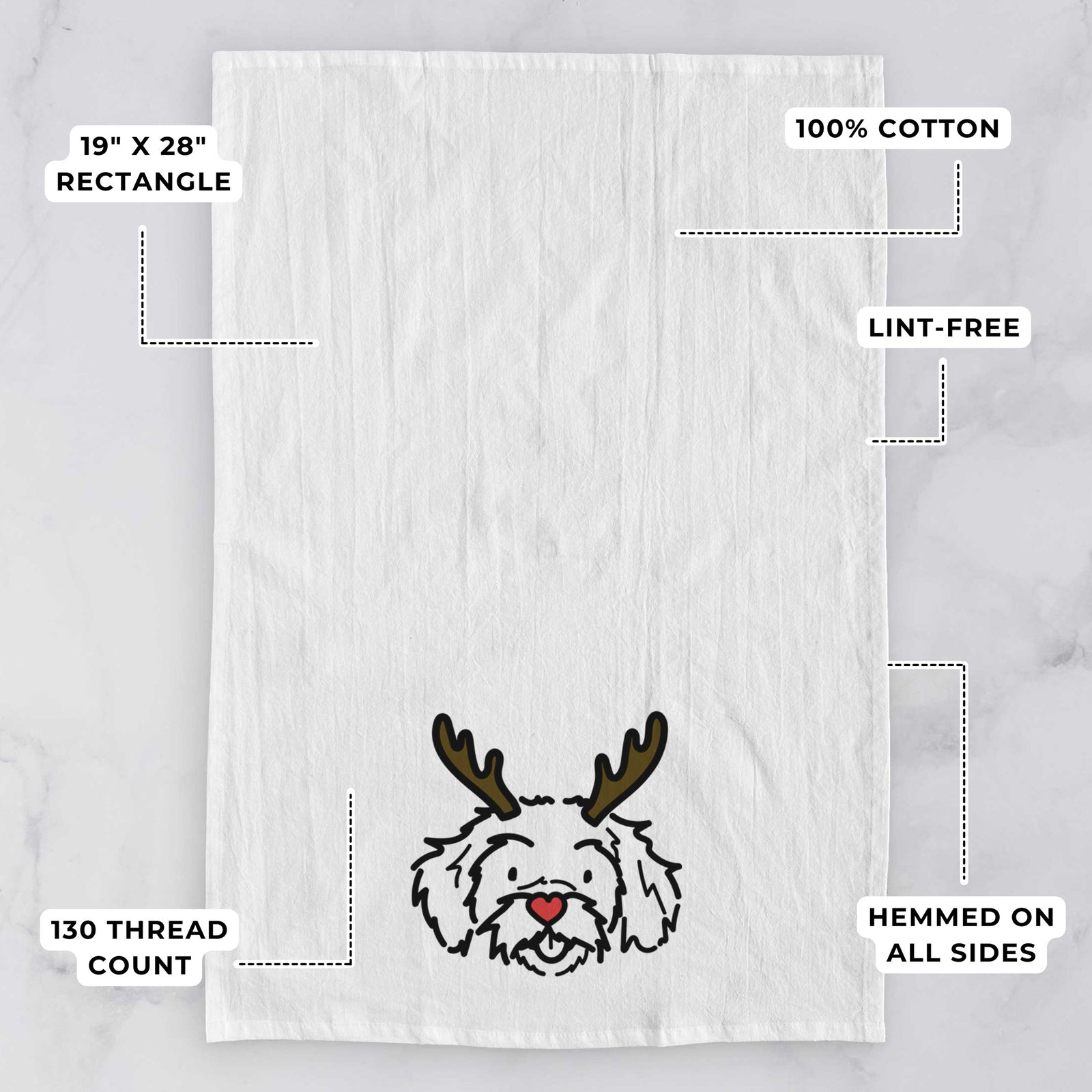 Minimalist line drawing of Jo Jo the Peekapoo with reindeer antlers and a red nose on a tea towel, with feature callouts: 19 x 28 inch rectangle, 100% cotton, lint-free, 120 thread count, hemmed on all sides