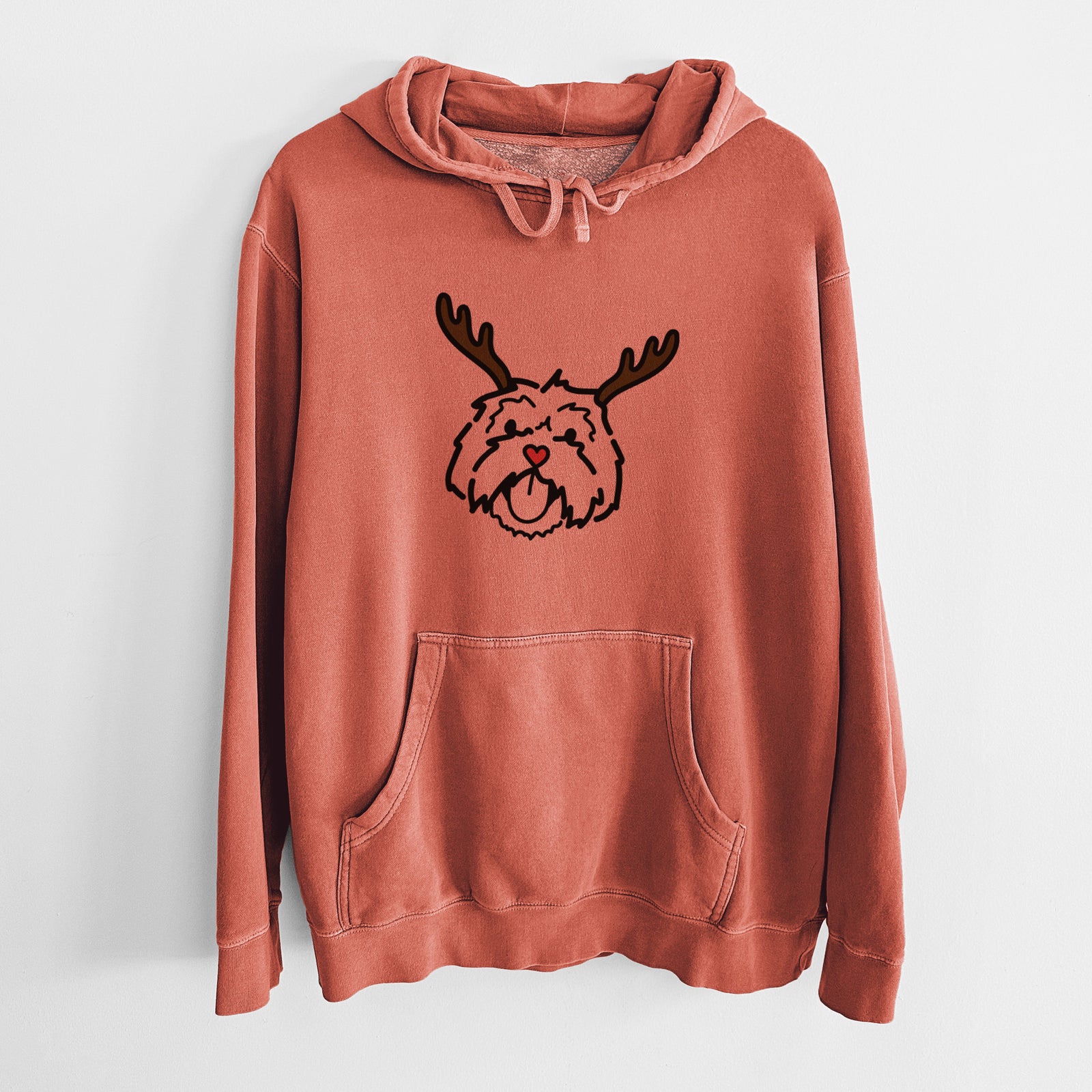 Minimalist line drawing of Keia the Lhasa Apso with reindeer antlers and a red nose on an Amber Unisex pigment dyed hoodie