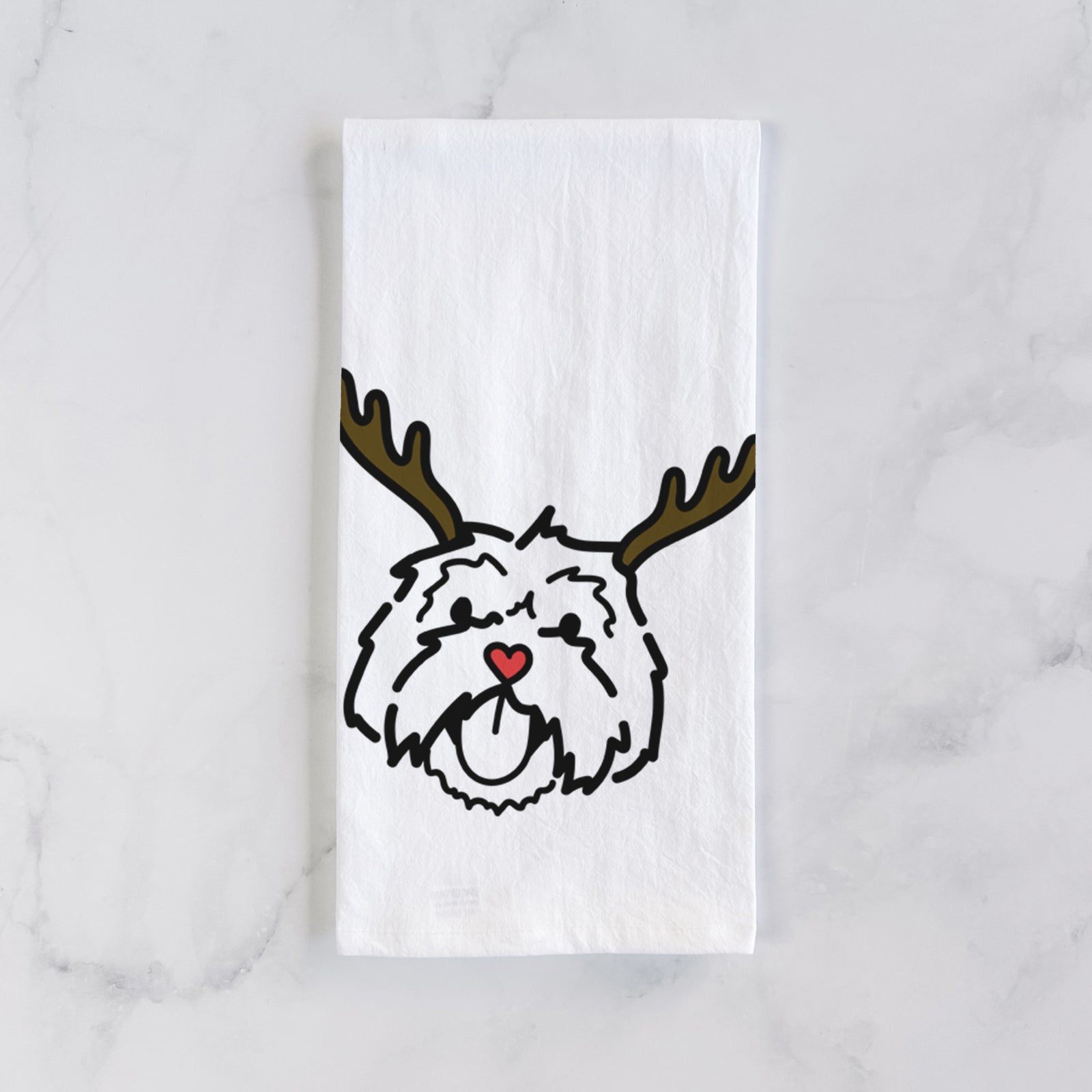 Minimalist line drawing of Keia the Lhasa Apso with reindeer antlers and a red nose on a tea towel