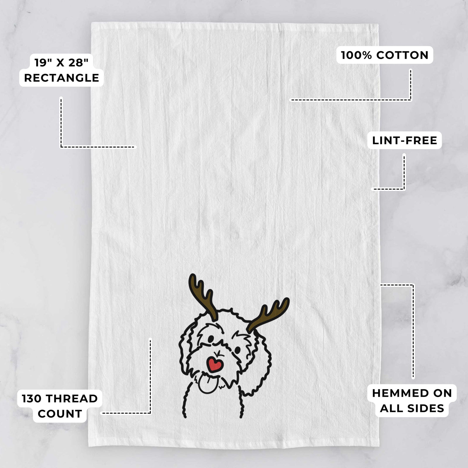 Minimalist line drawing of Mabel the Bernedoodle with reindeer antlers and a red nose on a tea towel, with feature callouts: 19 x 28 inch rectangle, 100% cotton, lint-free, 120 thread count, hemmed on all sides