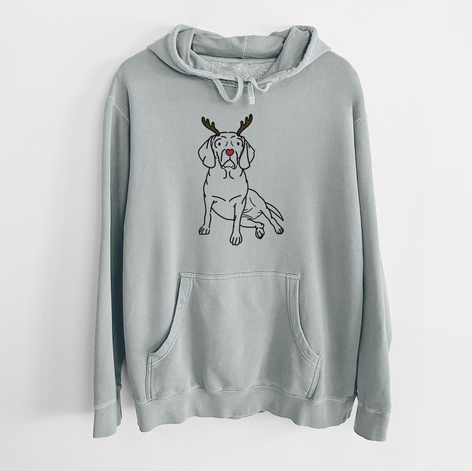 Minimalist line drawing of Mayble the Puggle with reindeer antlers and a red nose on a Sage Unisex pigment dyed hoodie
