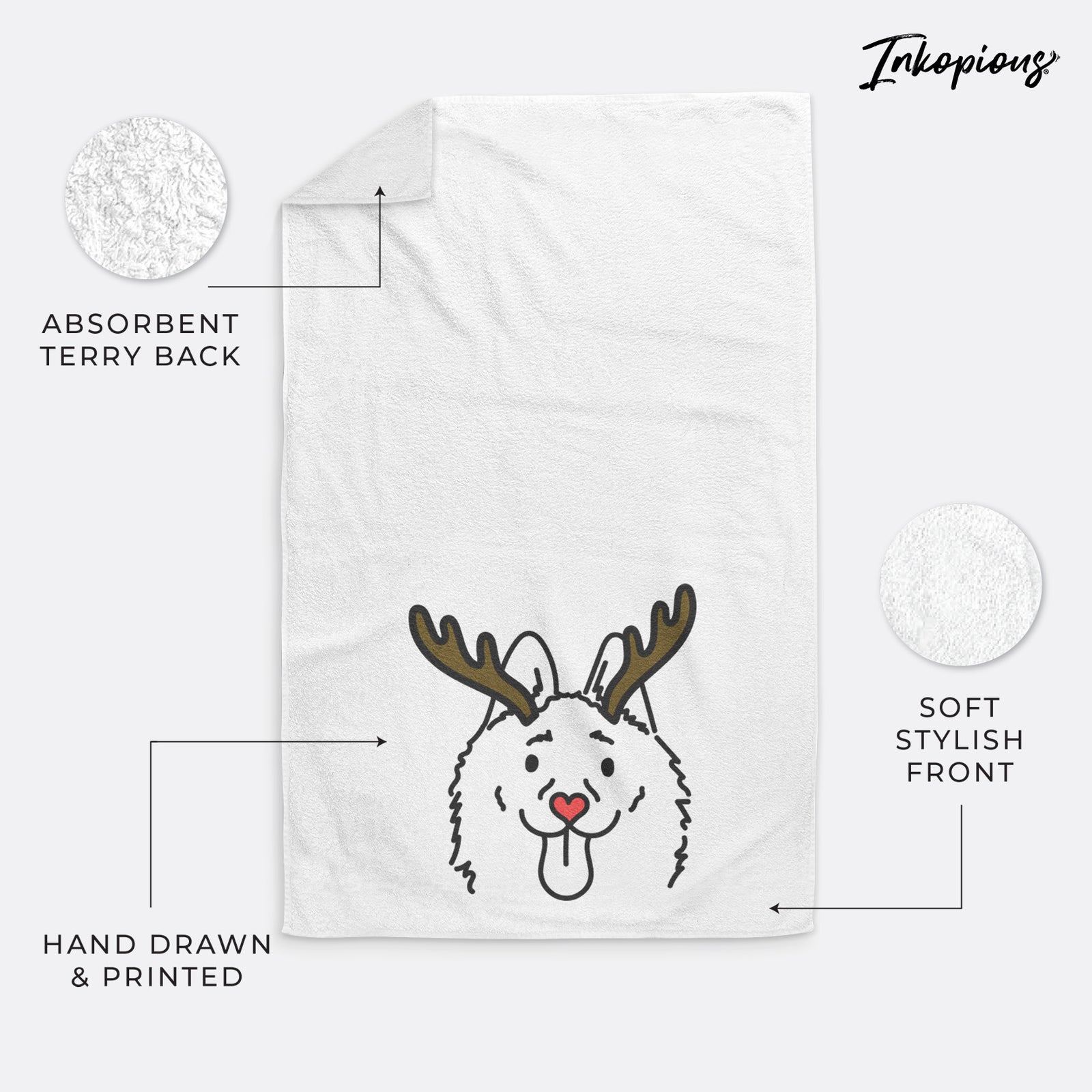 Minimalist line drawing of Meeko the Schipperke with reindeer antlers and a red nose on a decorative hand towel