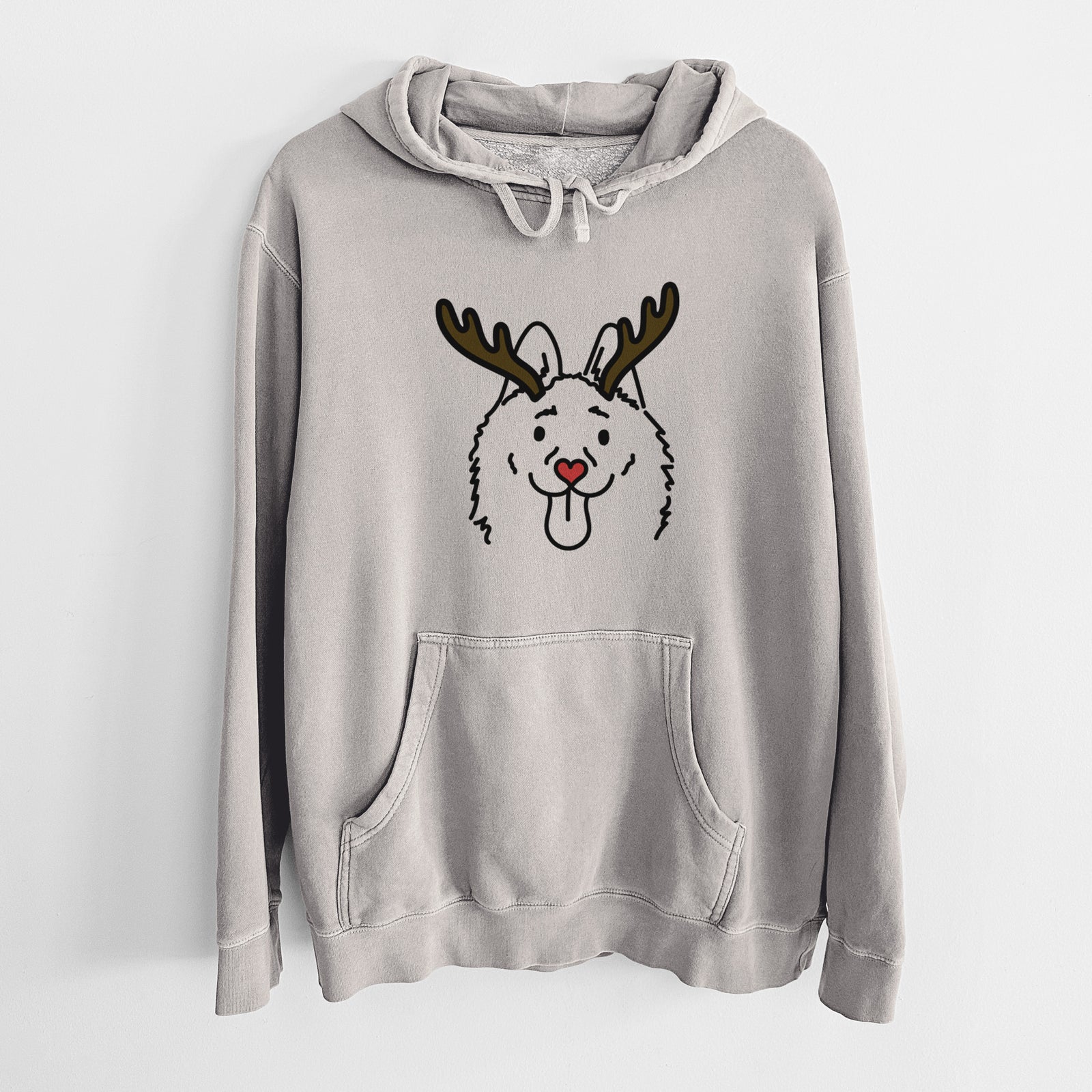 Minimalist line drawing of Meeko the Schipperke with reindeer antlers and a red nose on a Cement Unisex pigment dyed hoodie
