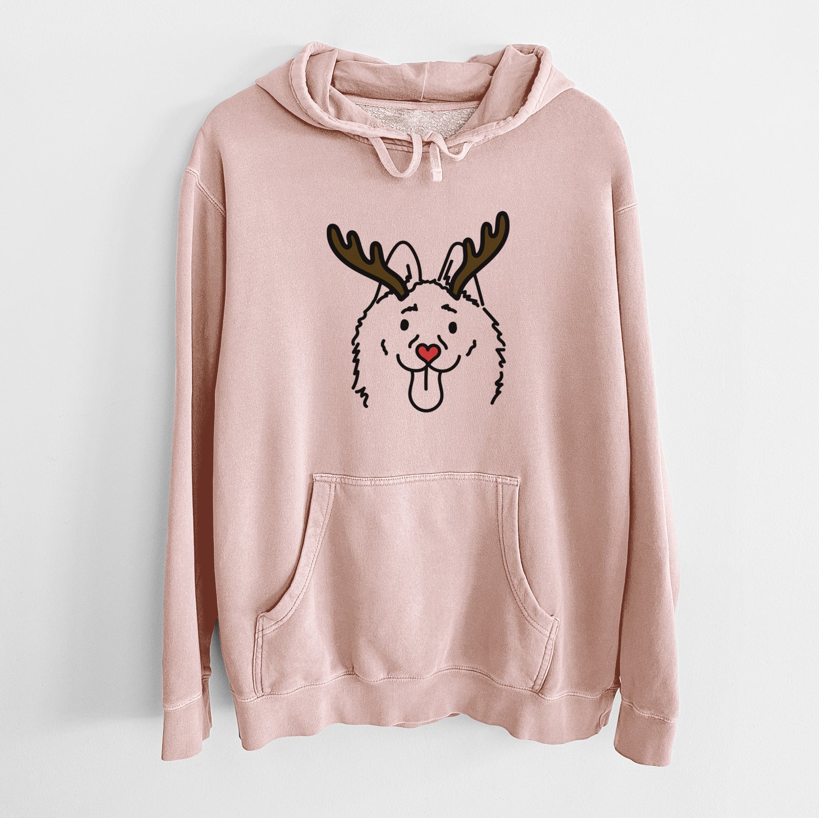 Minimalist line drawing of Meeko the Schipperke with reindeer antlers and a red nose on a Dusty Pink Unisex pigment dyed hoodie