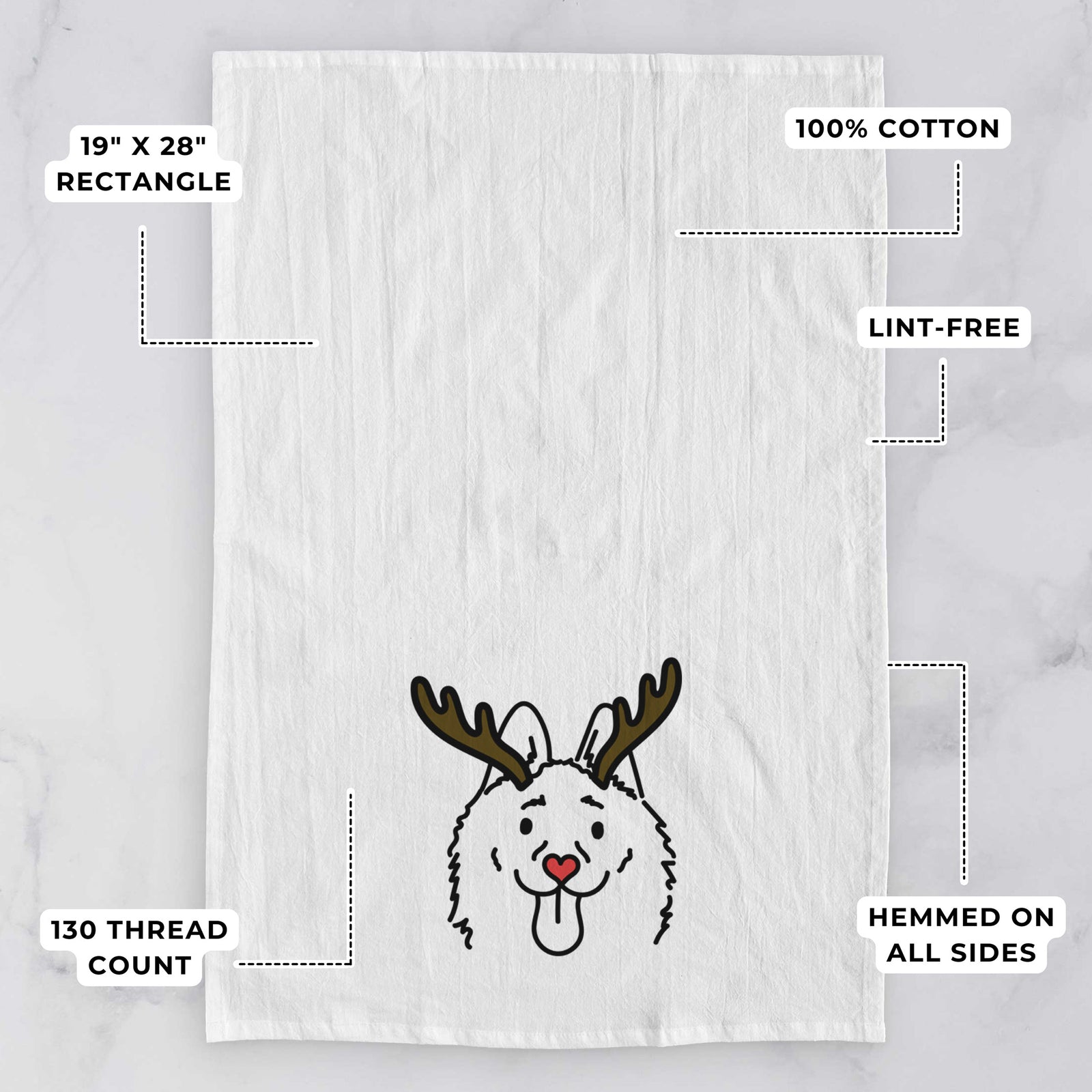 Minimalist line drawing of Meeko the Schipperke with reindeer antlers and a red nose on a tea towel, with feature callouts: 19 x 28 inch rectangle, 100% cotton, lint-free, 120 thread count, hemmed on all sides