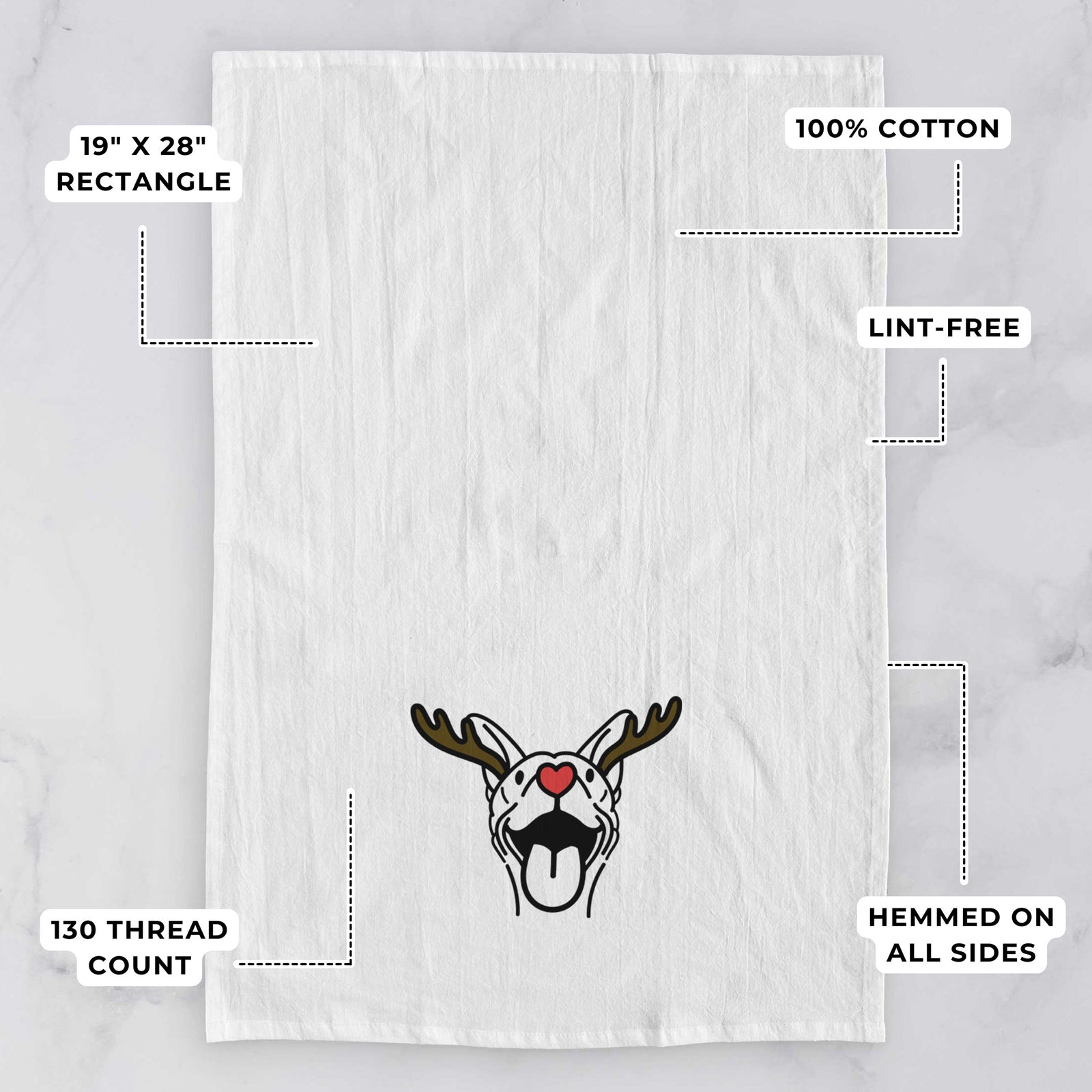 Minimalist line drawing of Merlin the Basenji with reindeer antlers and a red nose on a tea towel, with feature callouts: 19 x 28 inch rectangle, 100% cotton, lint-free, 120 thread count, hemmed on all sides
