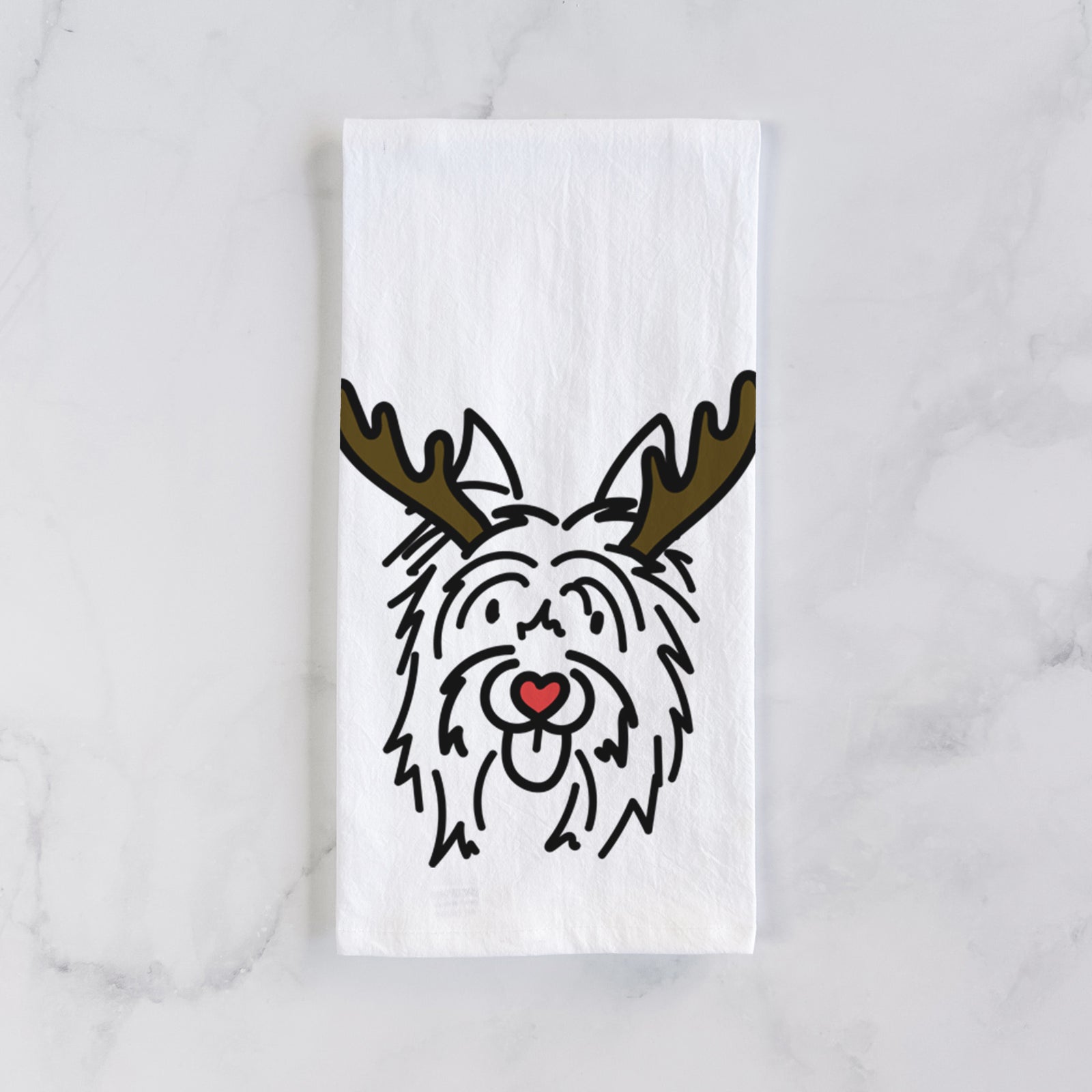 Minimalist line drawing of Monty the Silky Terrier with reindeer antlers and a red nose on a tea towel