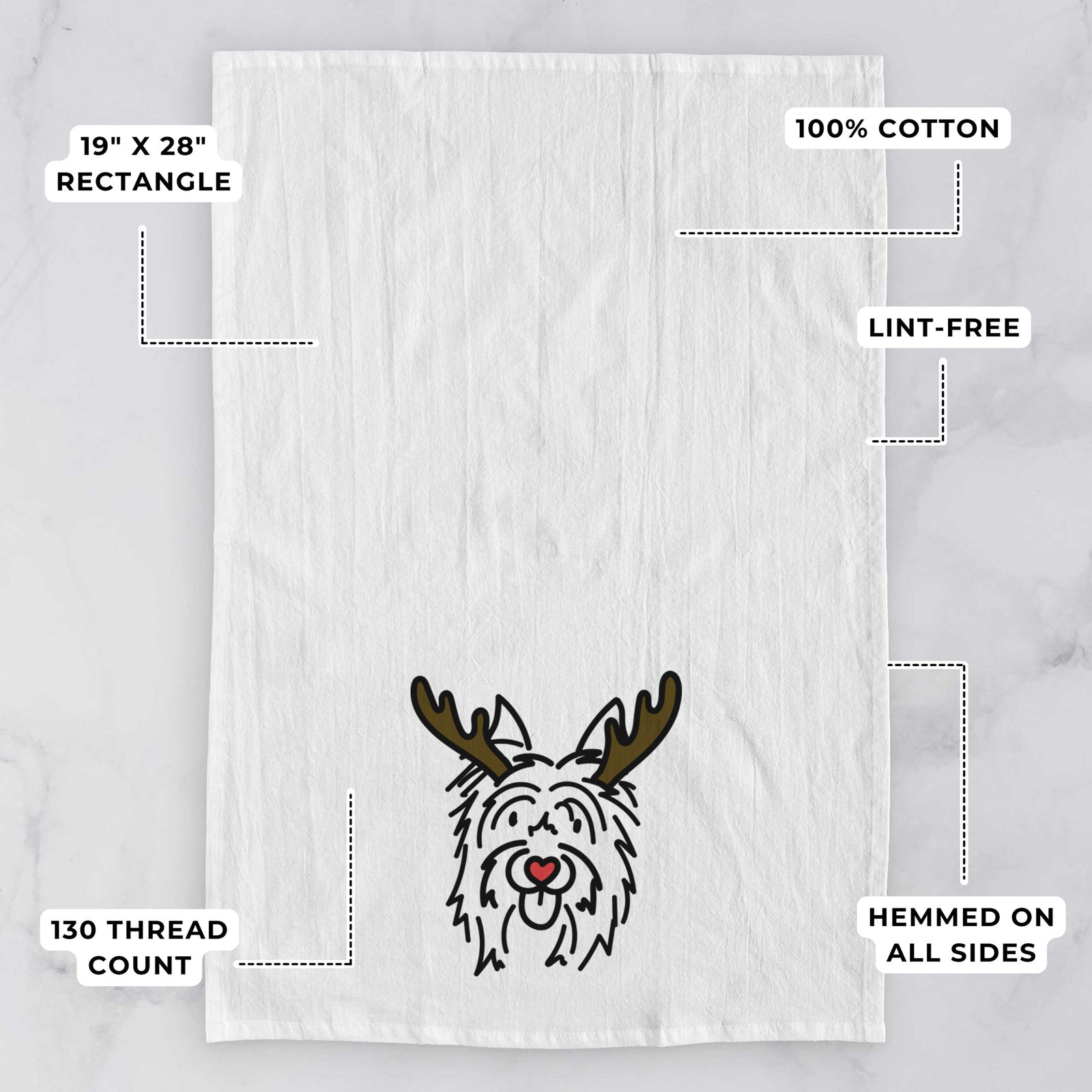 Minimalist line drawing of Monty the Silky Terrier with reindeer antlers and a red nose on a tea towel, with feature callouts: 19 x 28 inch rectangle, 100% cotton, lint-free, 120 thread count, hemmed on all sides