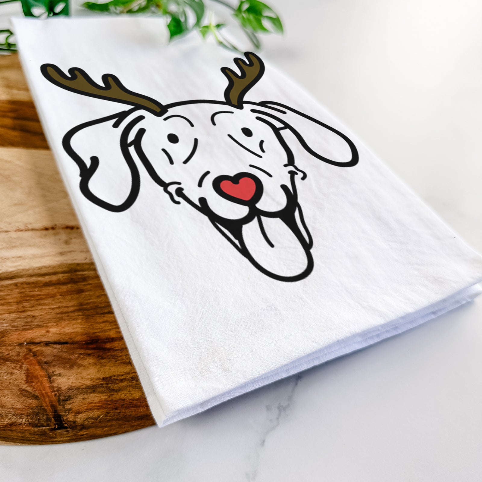 Minimalist line drawing of Paco Lobo the Weimaraner with reindeer antlers and a red nose on a tea towel
