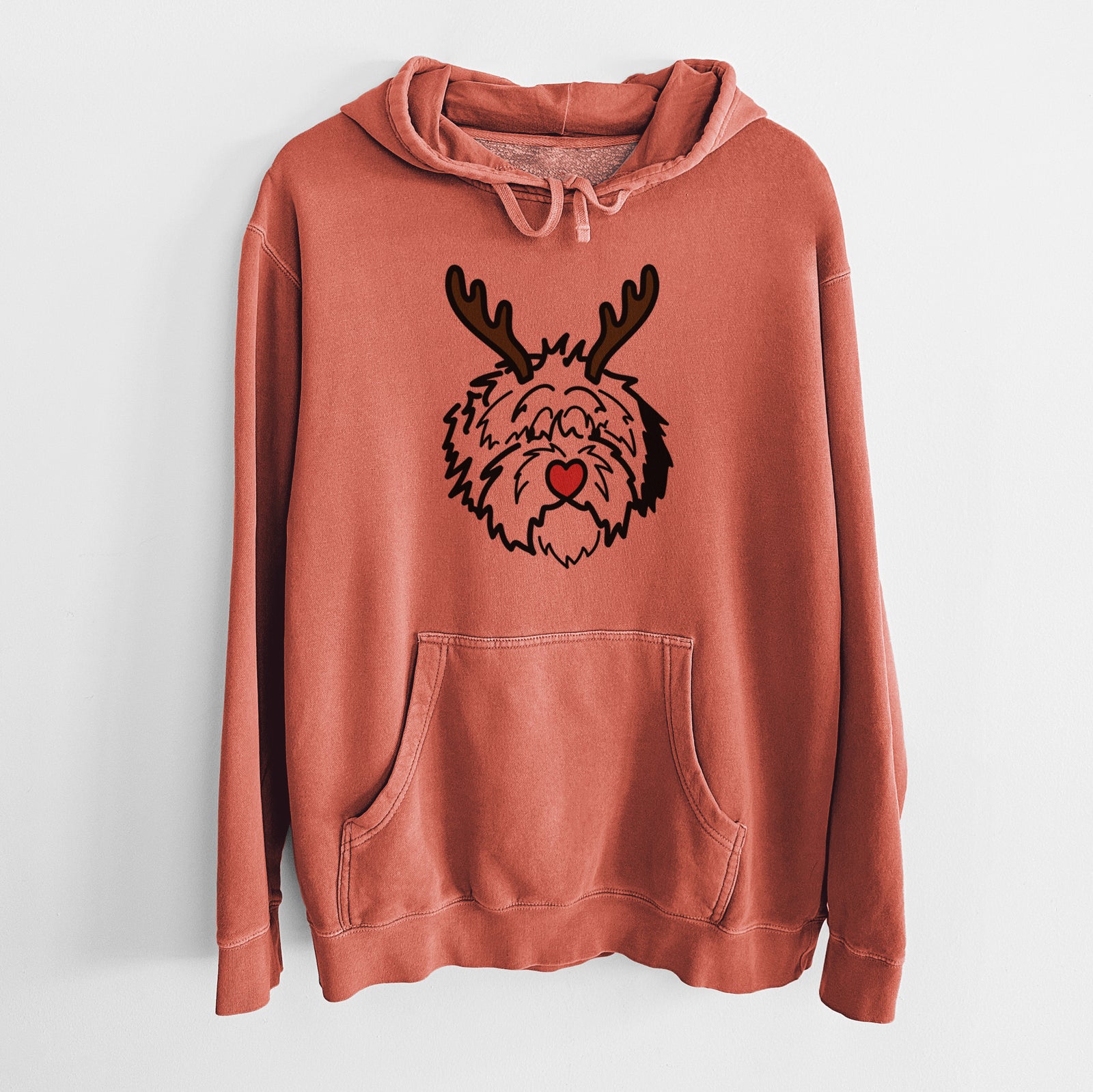 Minimalist line drawing of Penny the Old English Sheepdog with reindeer antlers and a red nose on an Amber Unisex pigment dyed hoodie