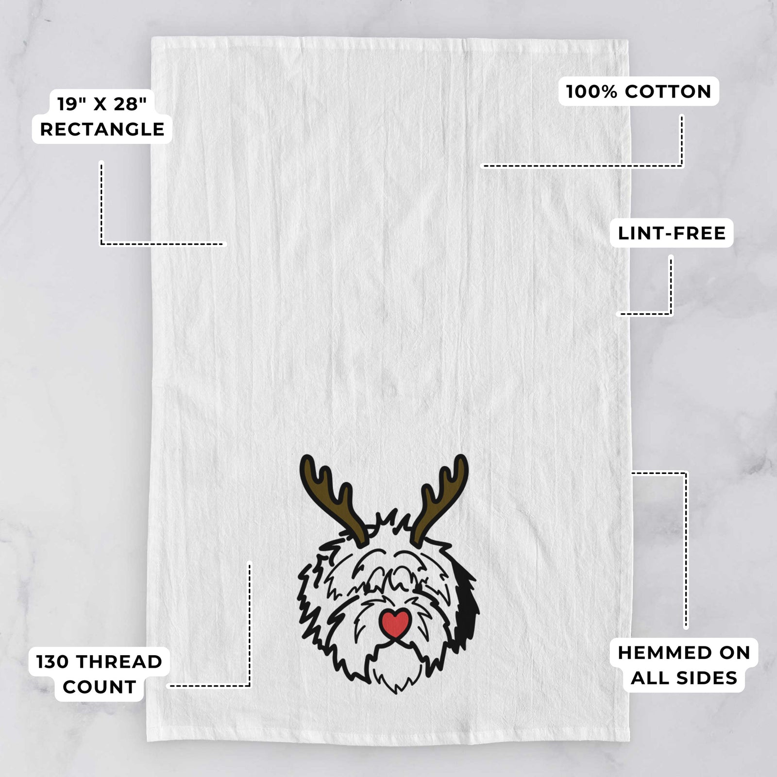 Minimalist line drawing of Penny the Old English Sheepdog with reindeer antlers and a red nose on a tea towel, with feature callouts: 19 x 28 inch rectangle, 100% cotton, lint-free, 120 thread count, hemmed on all sides