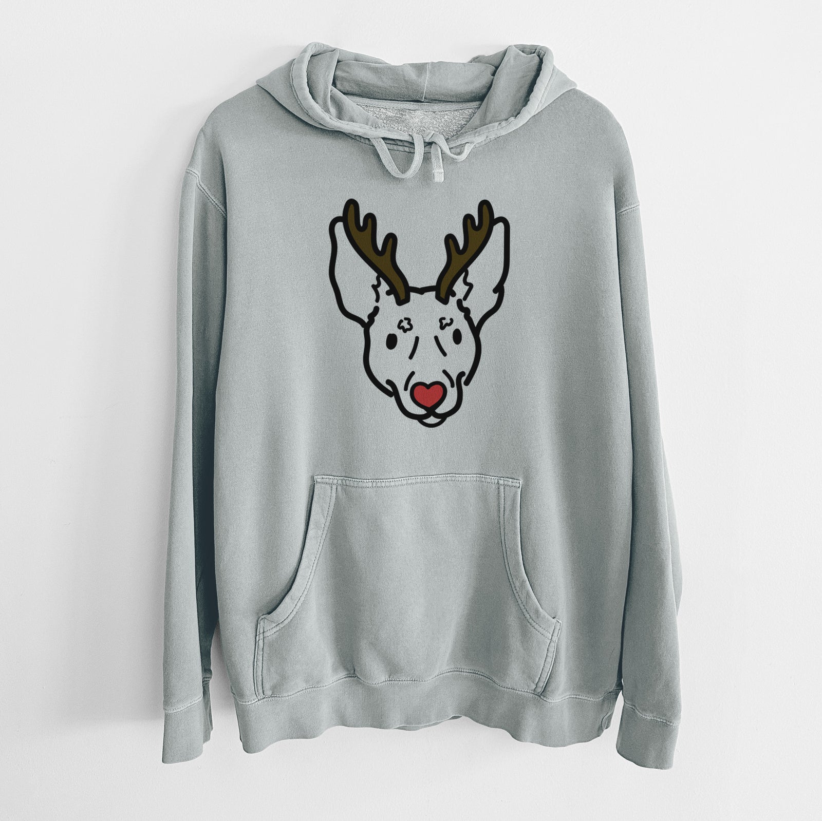 Minimalist line drawing of Penny the Rat Terrier with reindeer antlers and a red nose on a Sage Unisex pigment dyed hoodie
