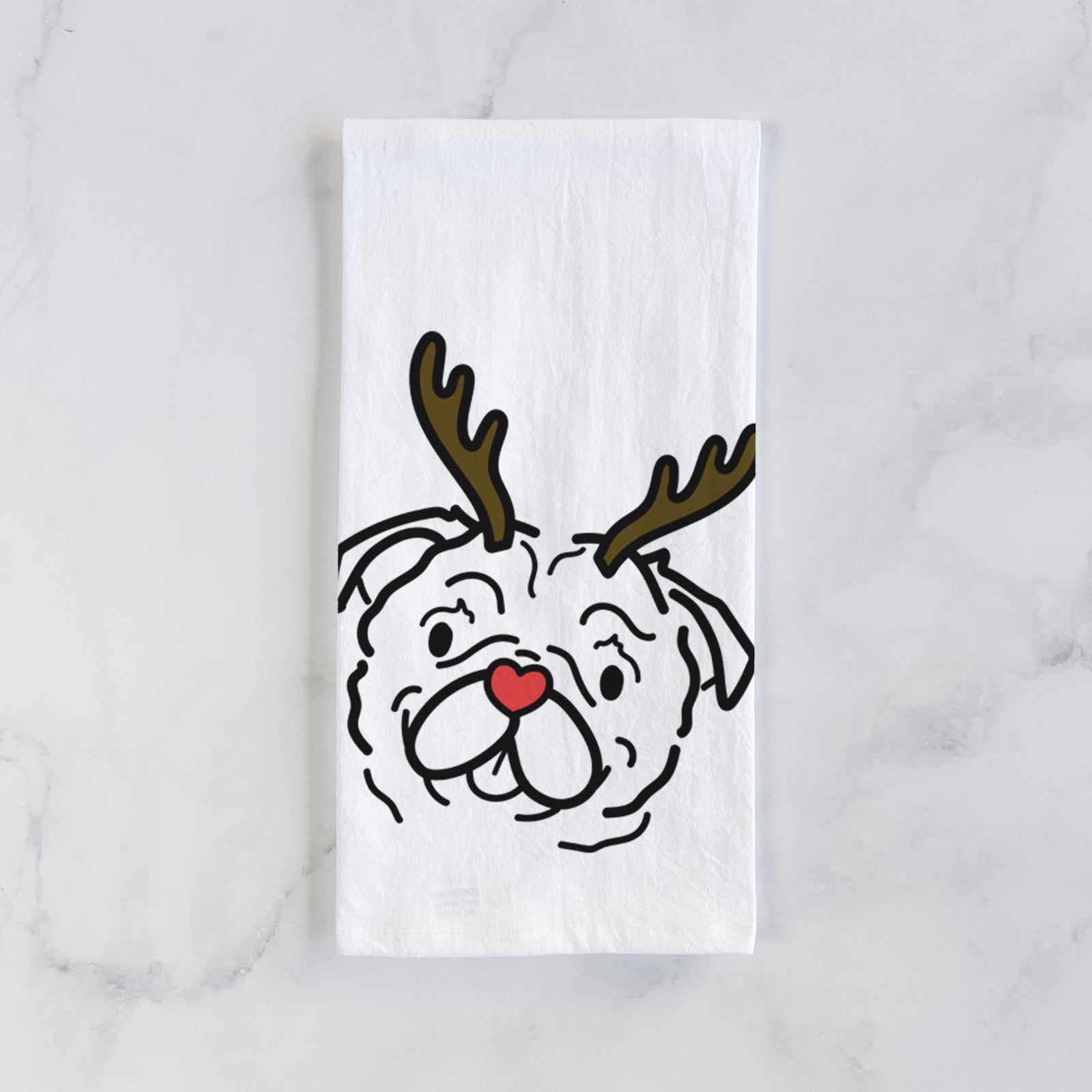 Minimalist line drawing of Pip the Pug with reindeer antlers and a red nose on a tea towel