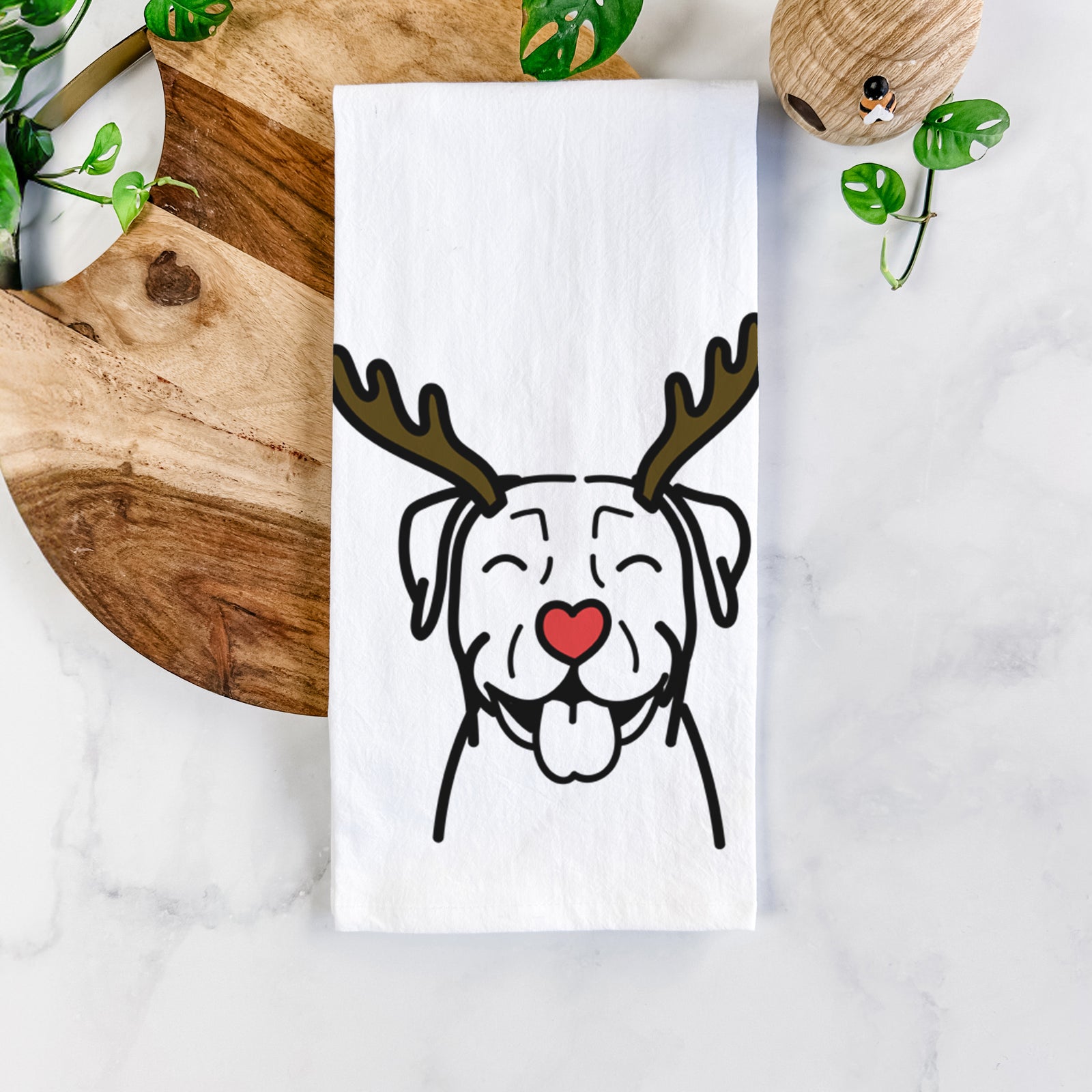 Minimalist line drawing of a Pitbull with reindeer antlers and a red nose on a tea towel